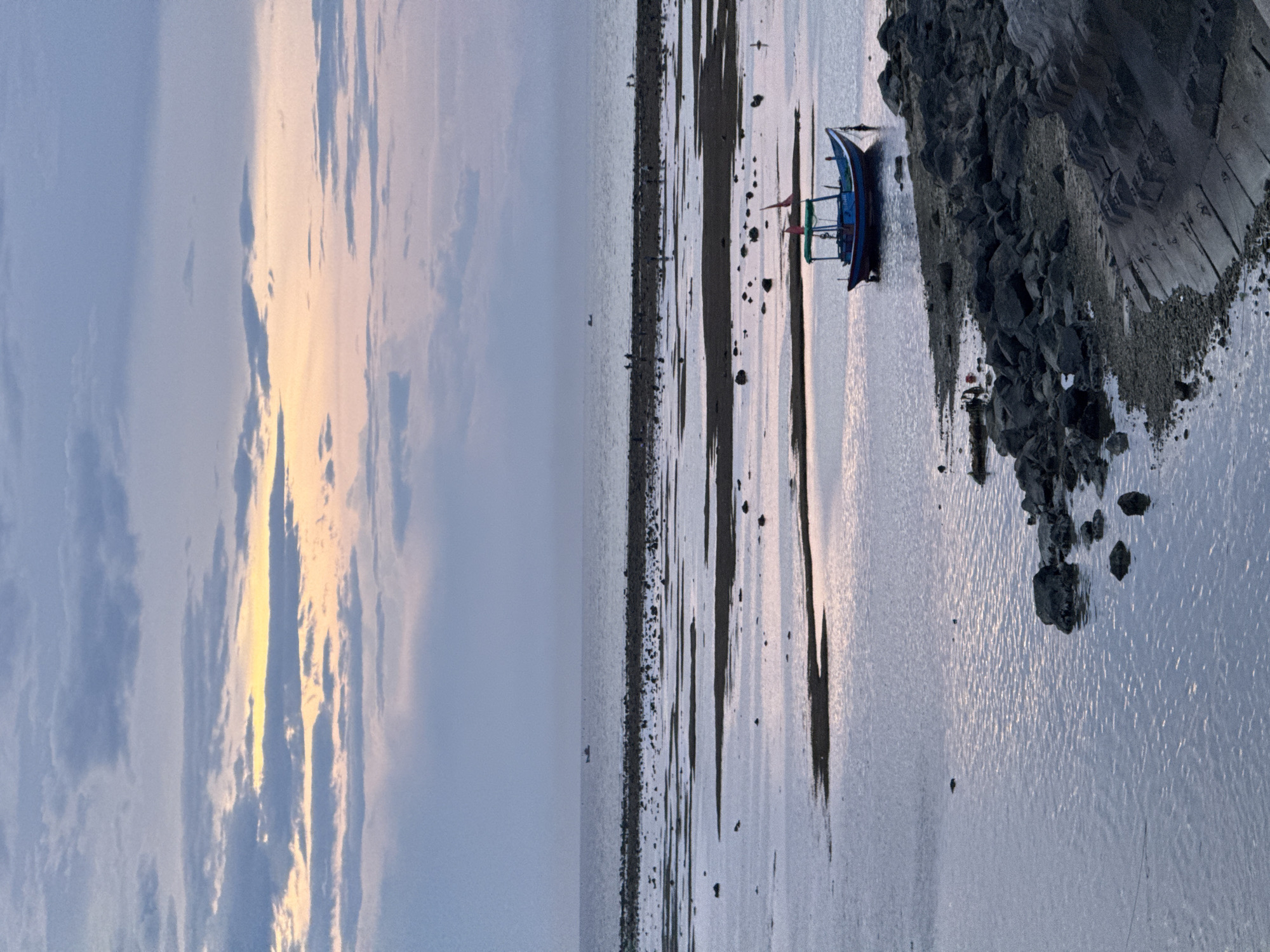Fishing boats at dusk in Lý Sơn Island harbor