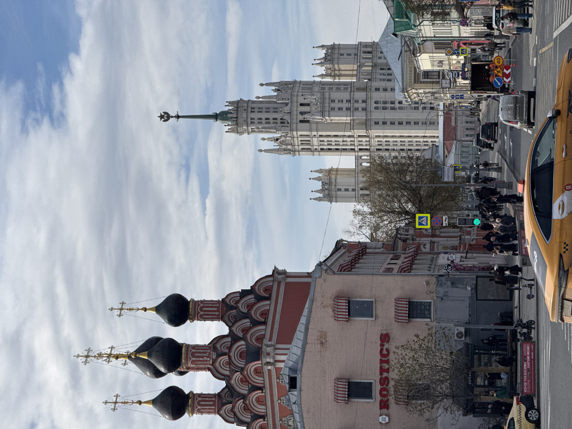 Moscow street scene with Stalinist skyscraper captured by witness