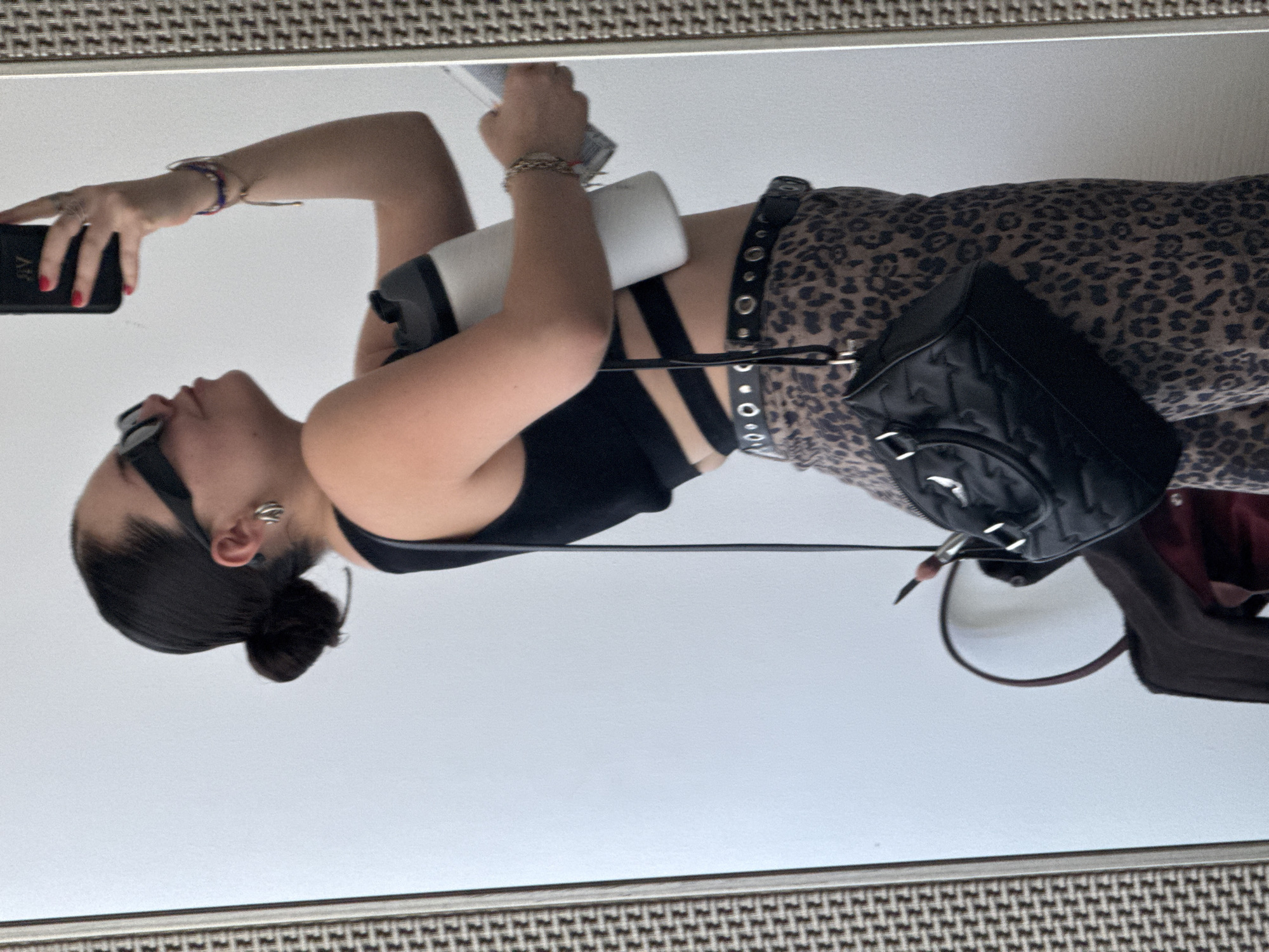 Fashion selfie session documented in Mexico City apartment