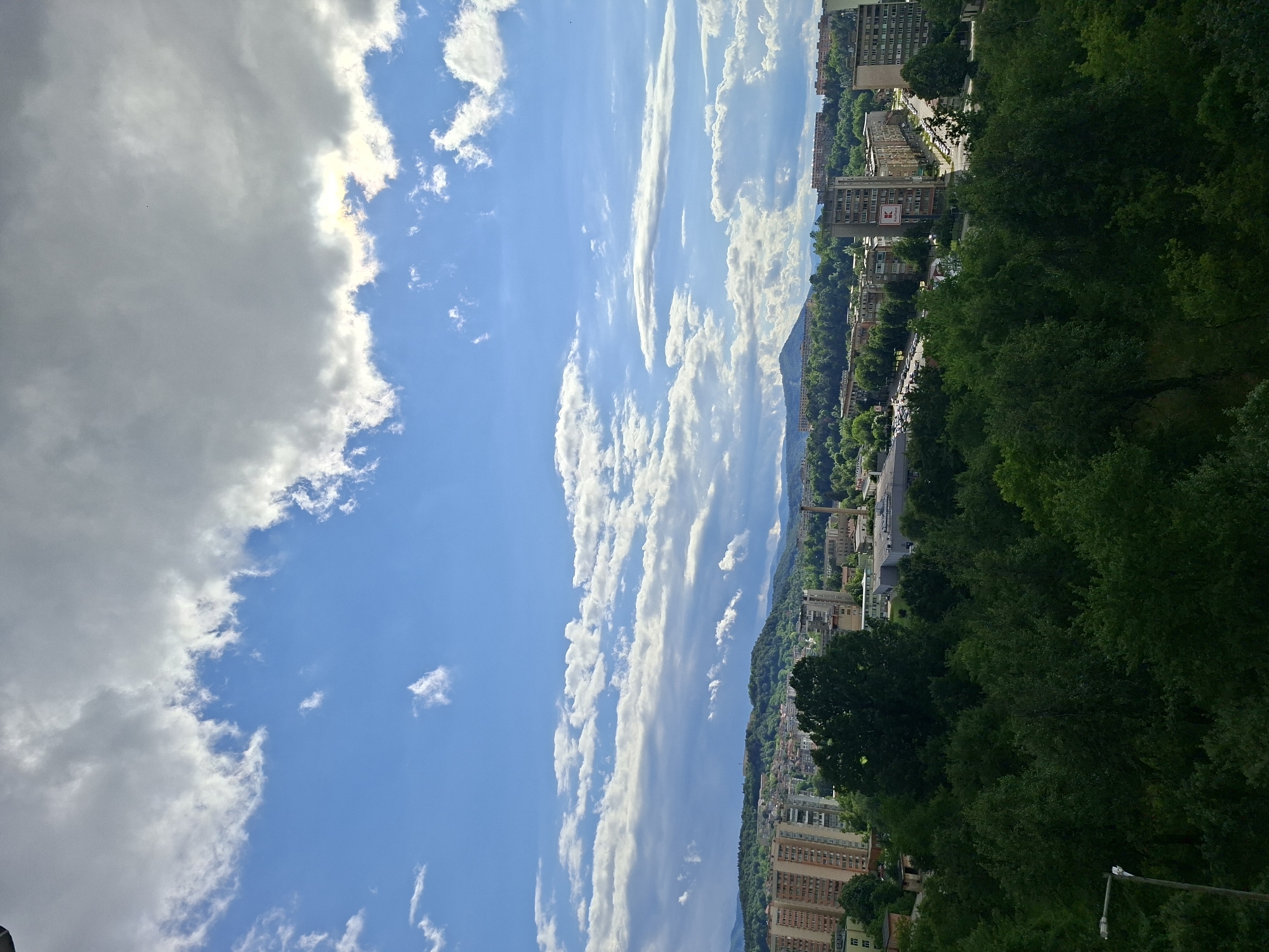 Panoramic view of Gabrovo cityscape under cloudy skies