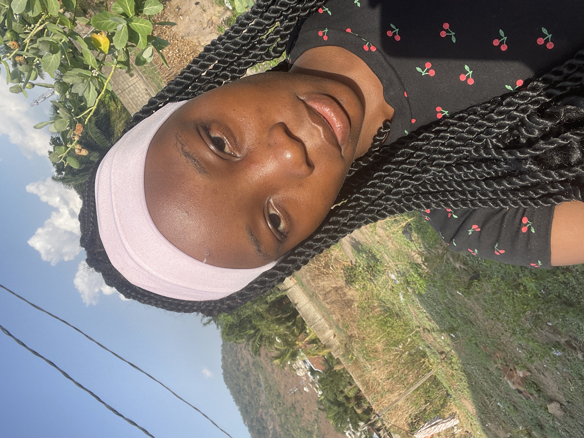 Woman photographed in sunny outdoor portraits in Lokoja, Nigeria
