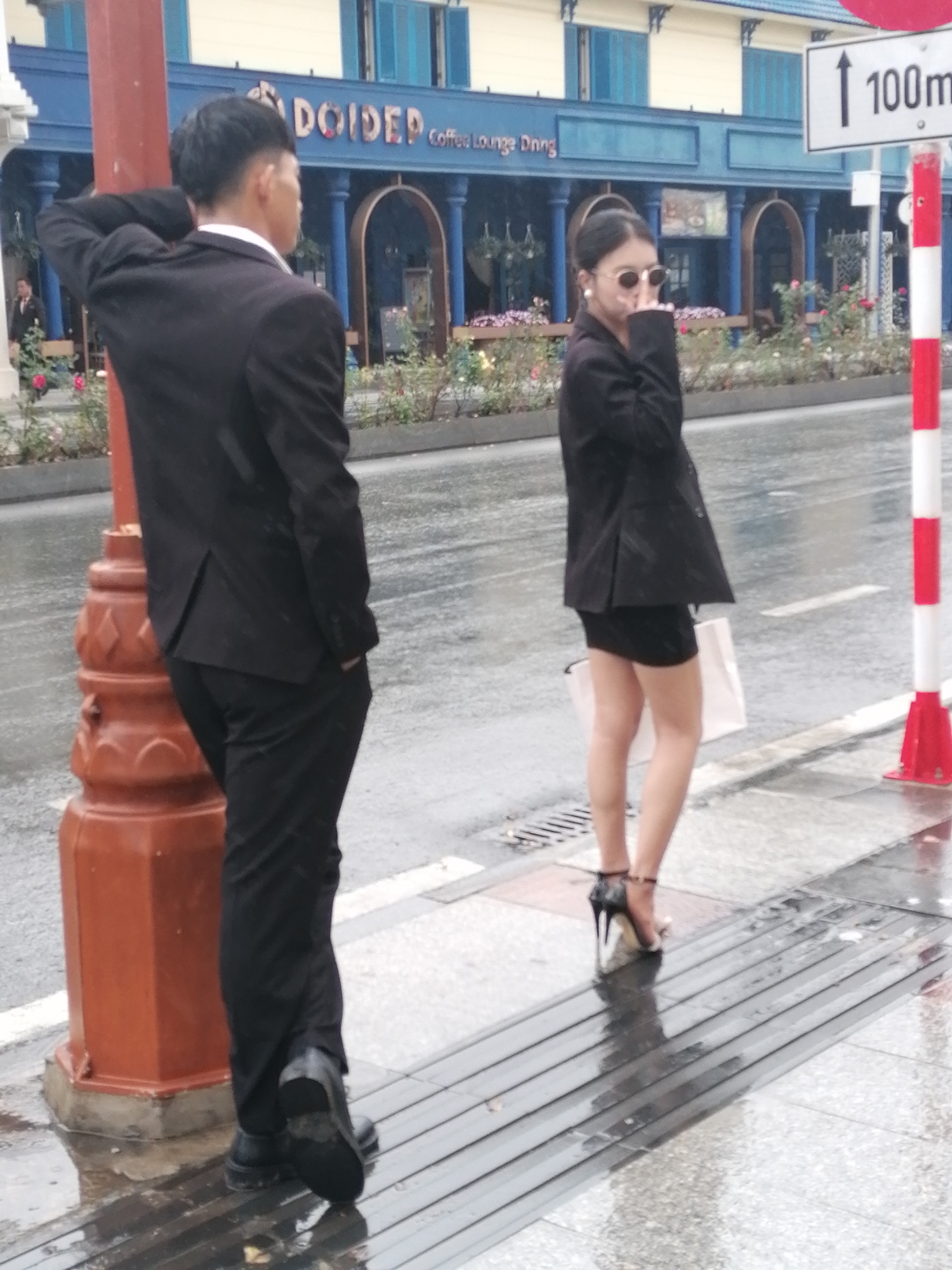 Rainy street fashion shoot in Da Lat, Vietnam