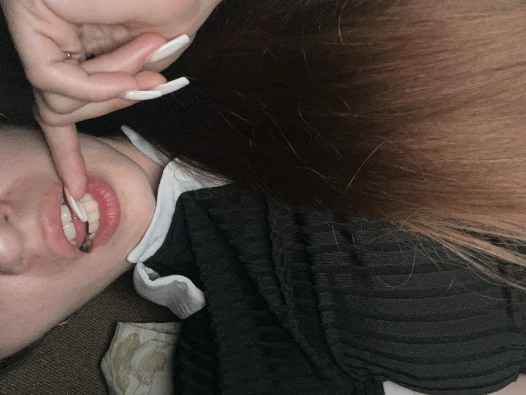 Playful close-up poses featuring a pink bear fan and acrylic nails