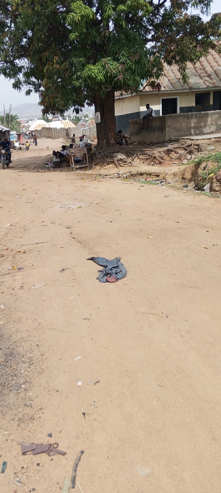 Daily life moments captured across New Nyanya residential streets