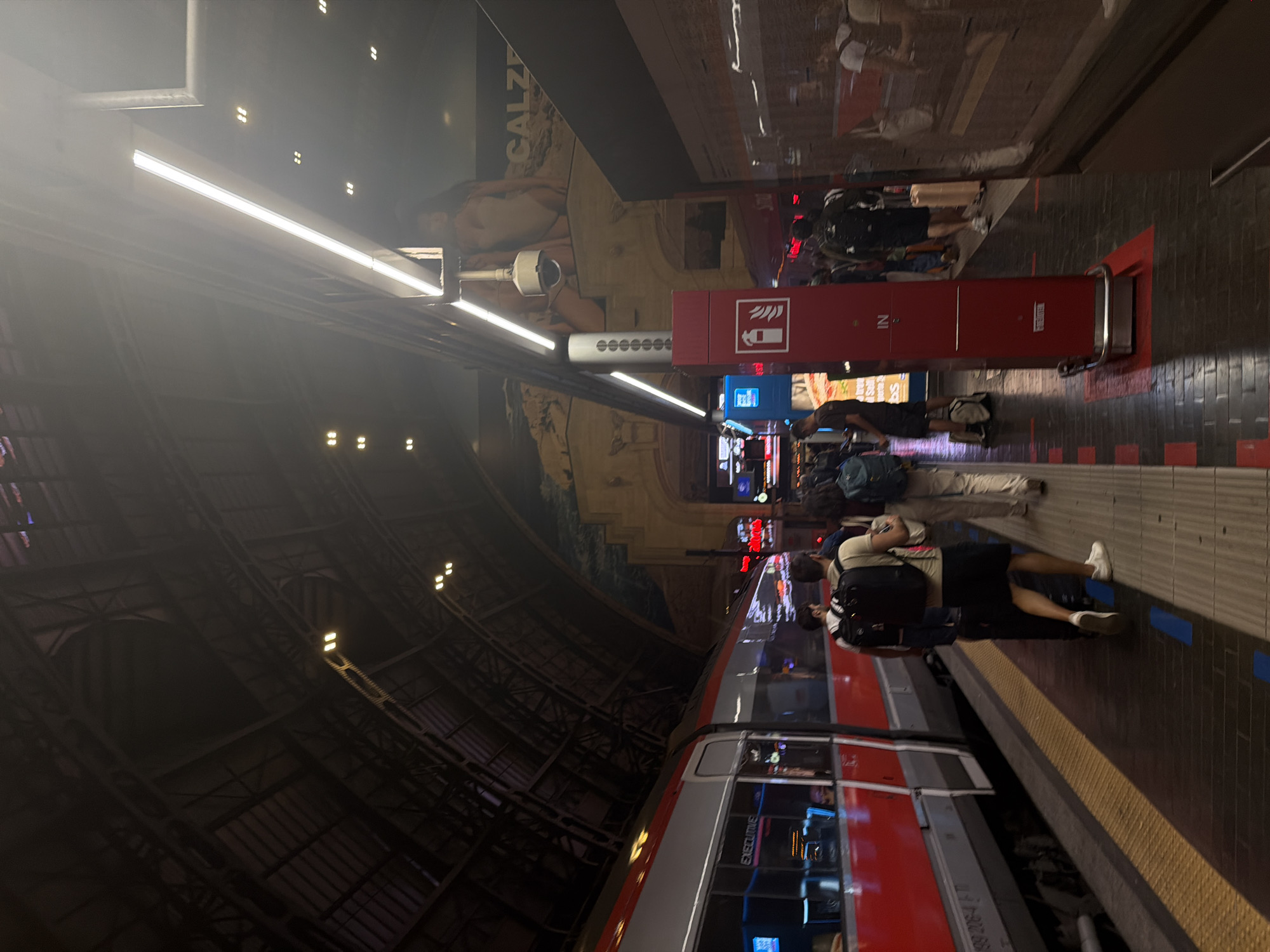 Evening scenes captured at Milan Centrale station, June 2026