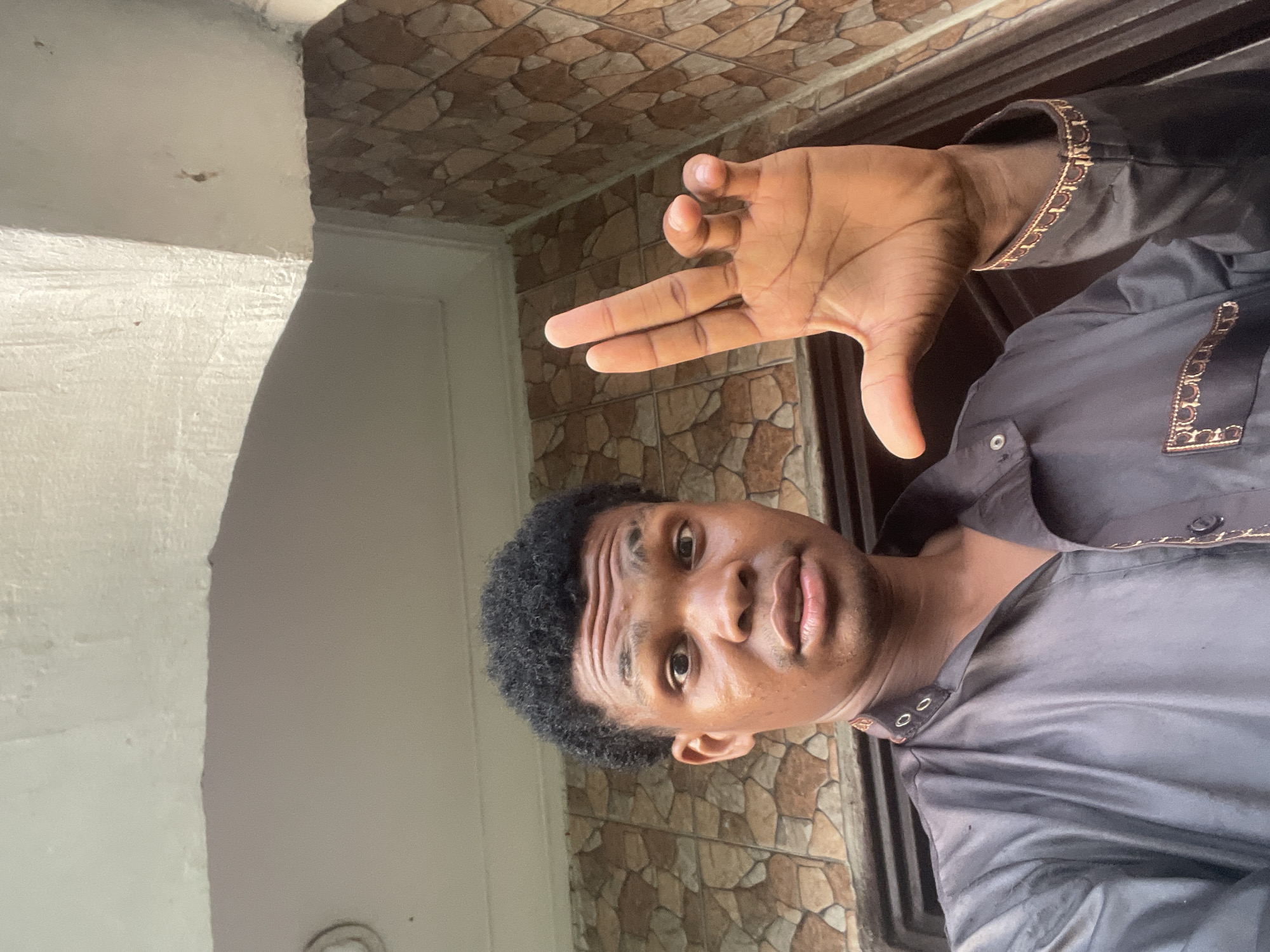 Daily life documented across Ado, Nigeria streets during evening hours