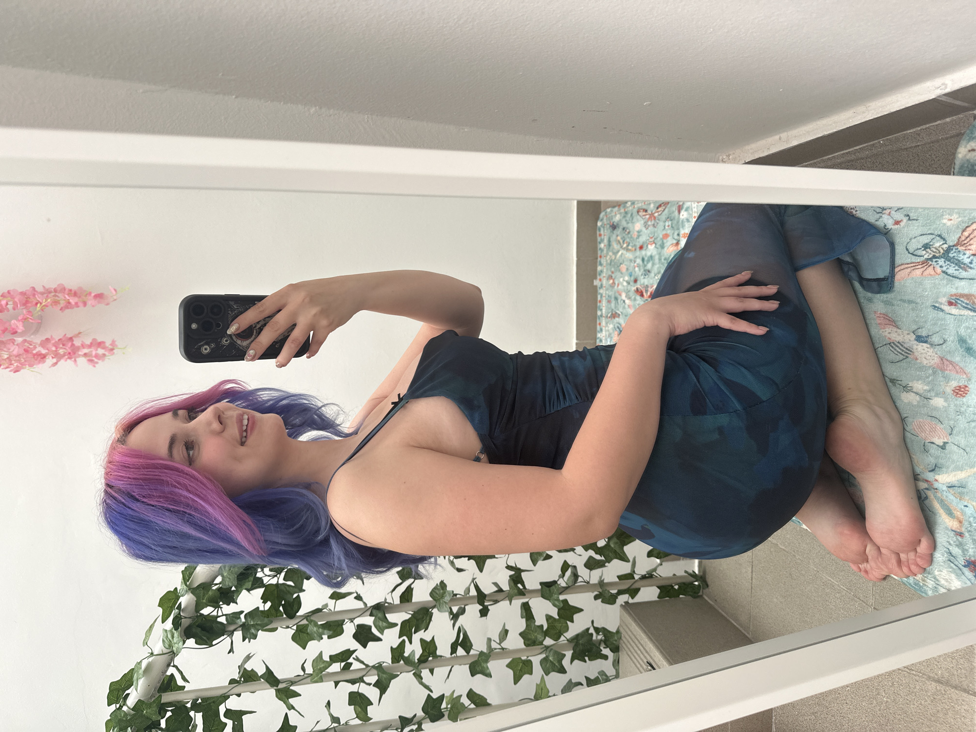 Woman takes colorful hair selfies in Zagreb apartment