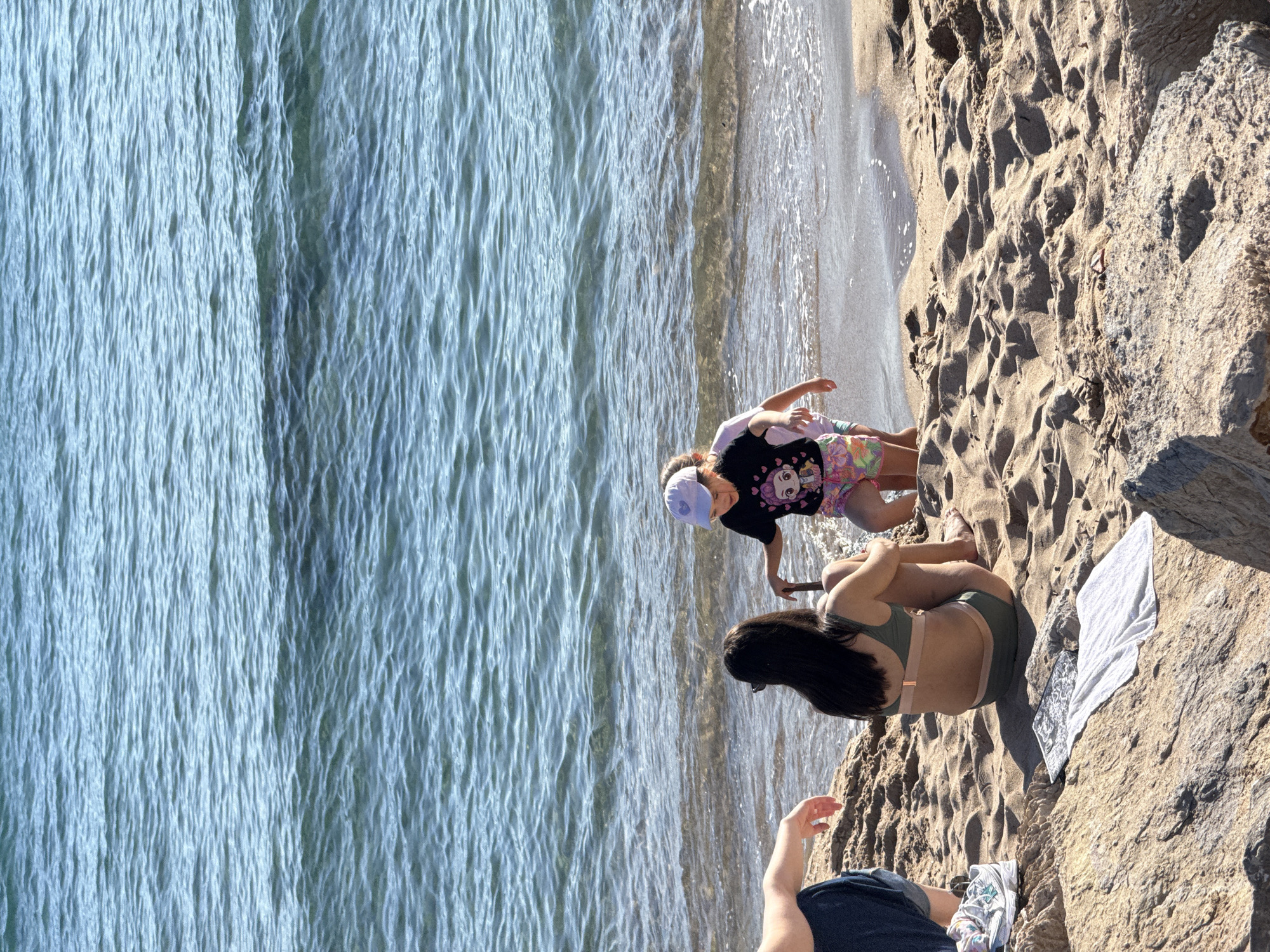Tourists enjoy sunny afternoon along Cannes waterfront