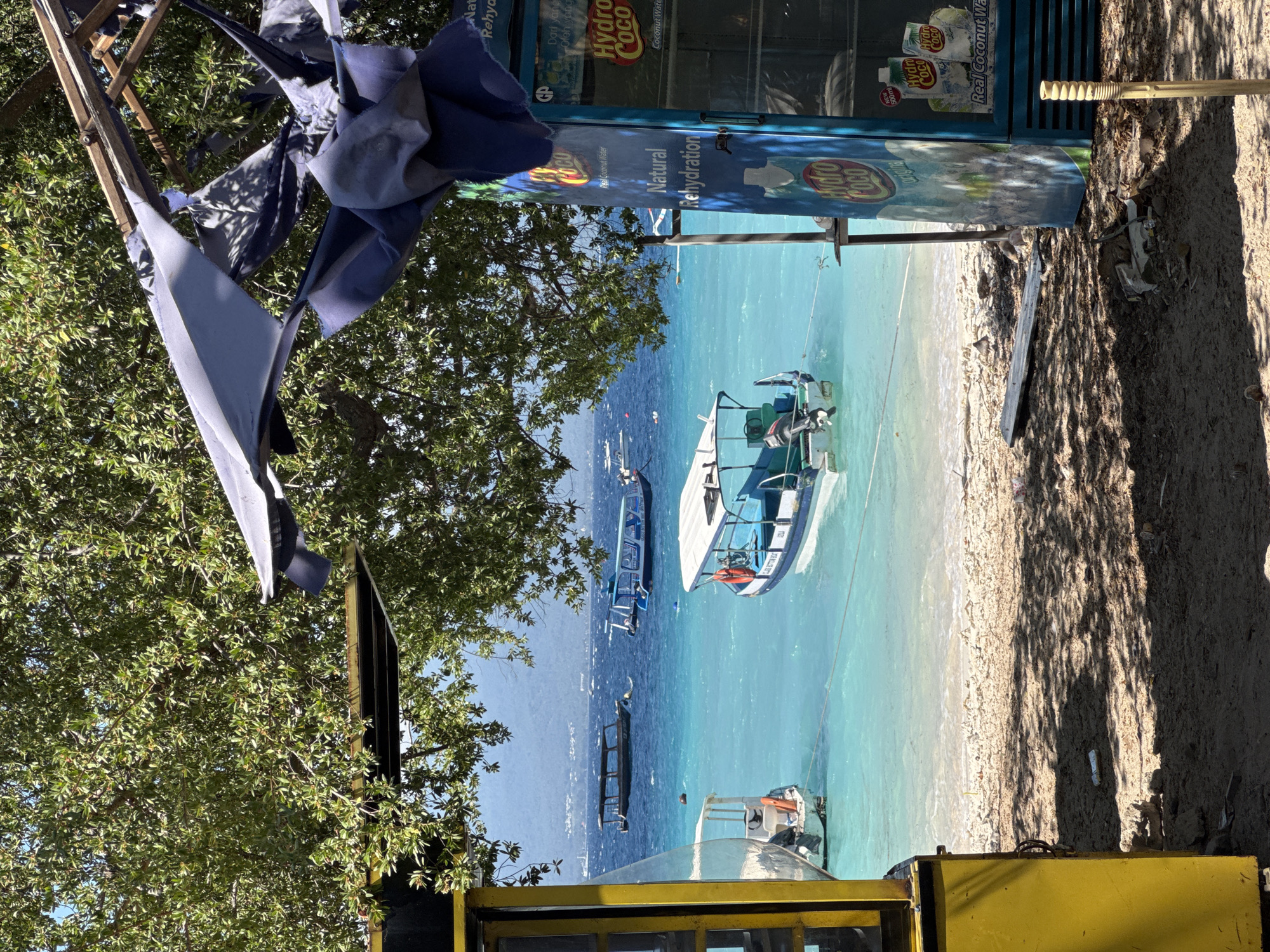 Lazy morning on an Indonesian beach, boats and all