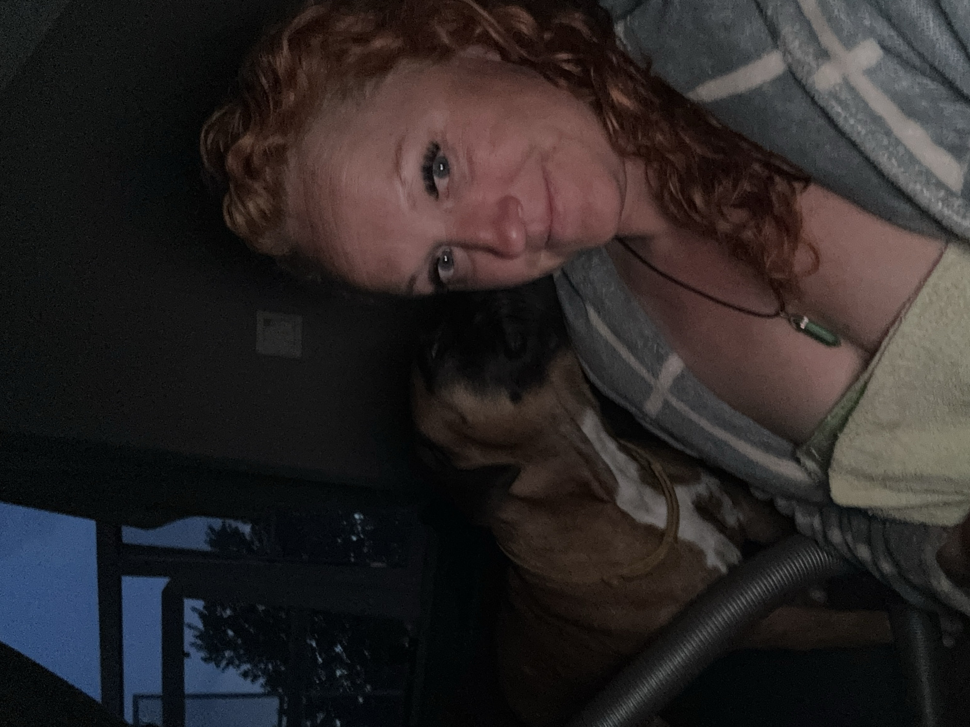 Woman photographed at home in Chaikovsky during evening hours