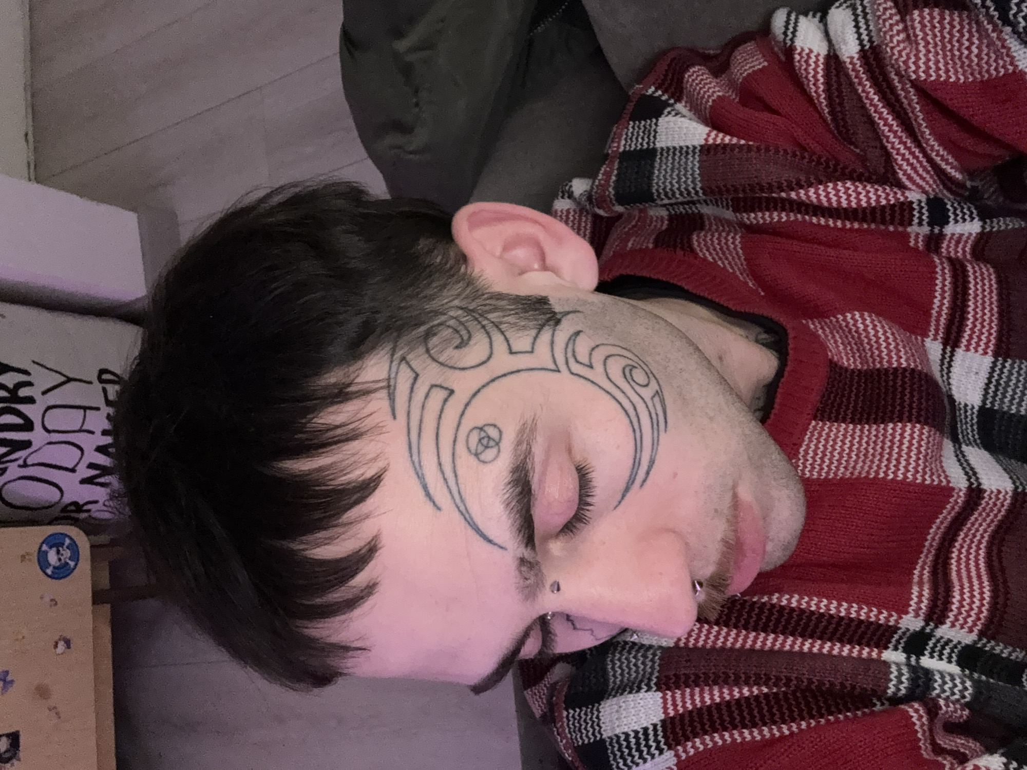 Tattooed face in close-up, Buenos Aires