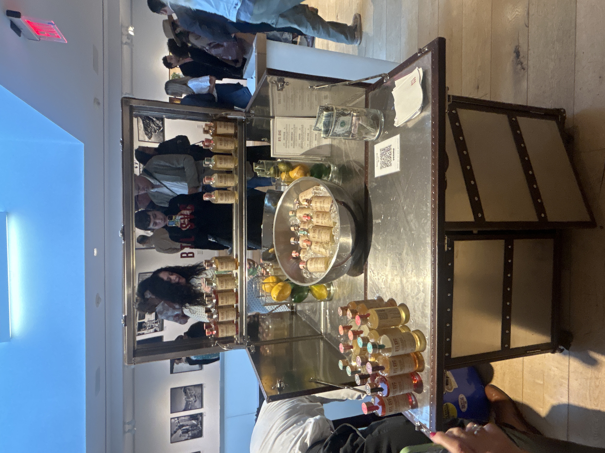 Early morning indoor event in West Hollywood features bar, artwork