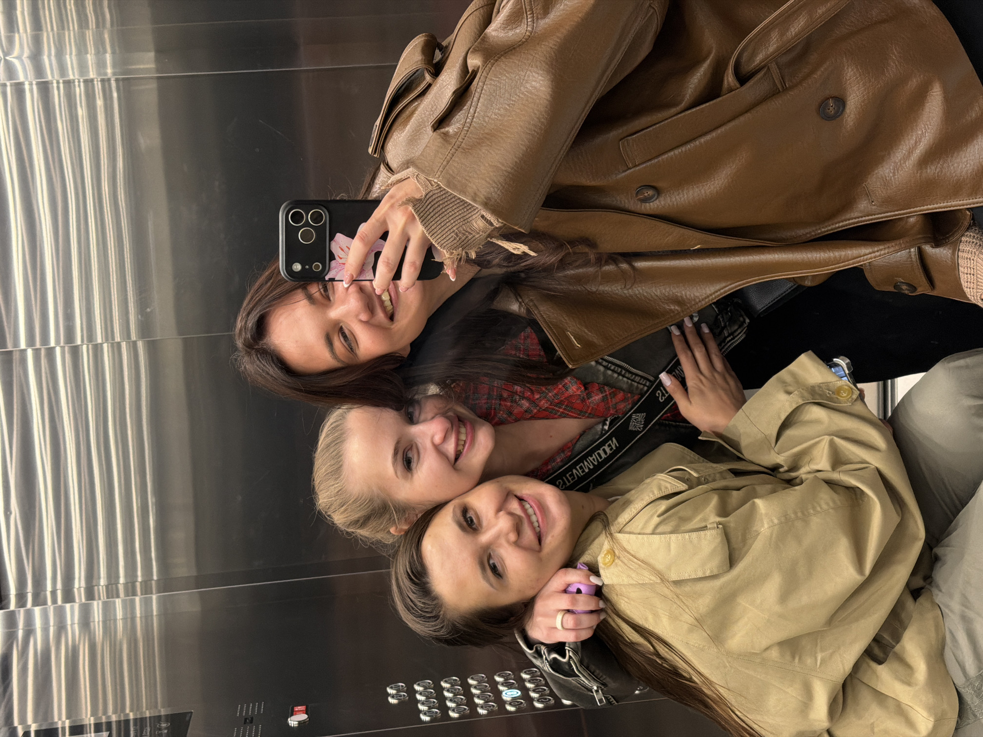 Late-night selfie captured in modern Belgrade building elevator