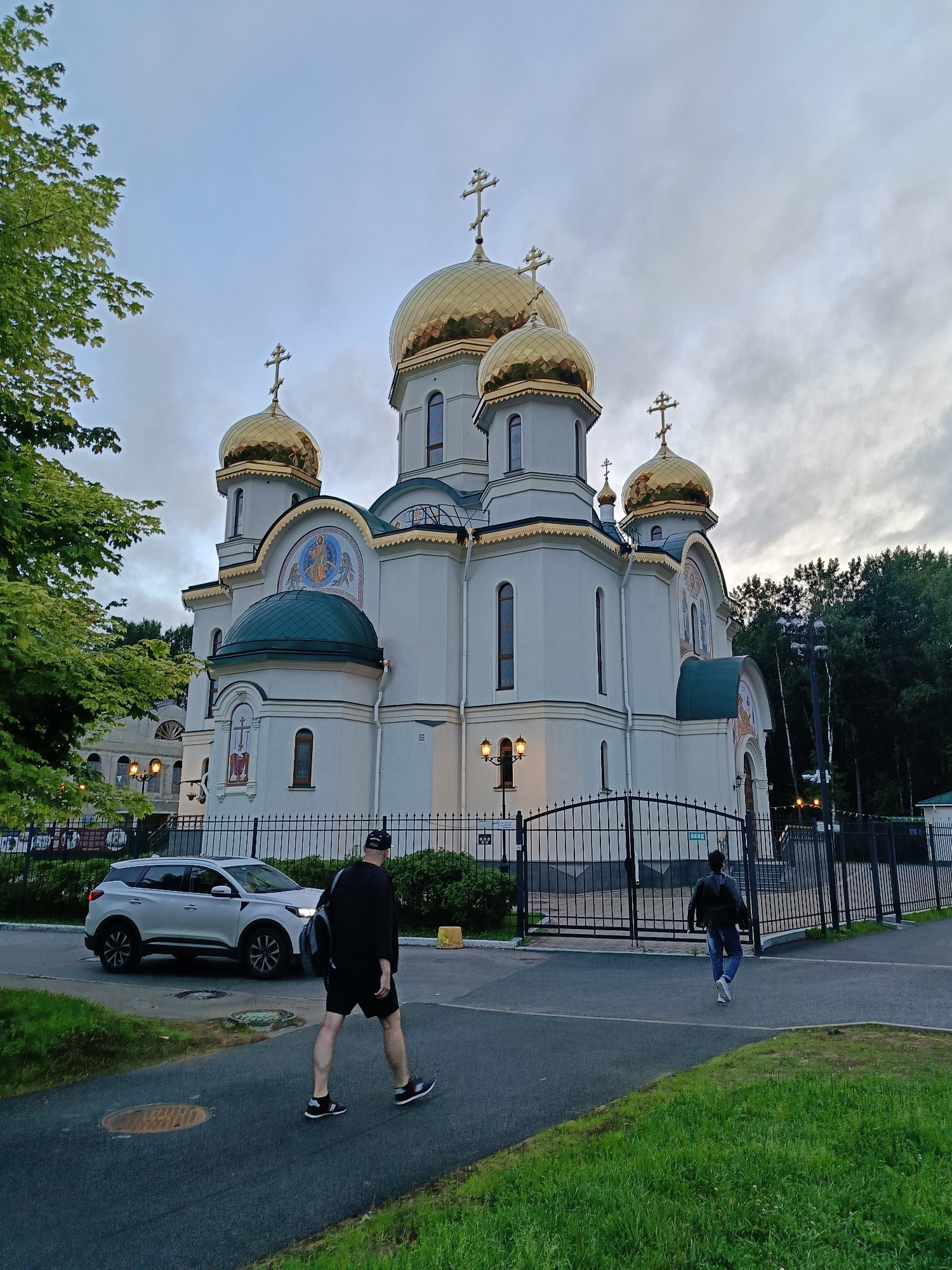 Orthodox church with golden domes, multiple exterior angles