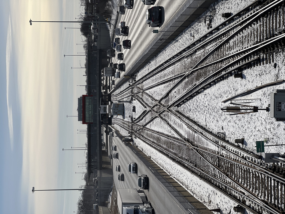 Chicago railway tracks and bridge walkways show snow cover