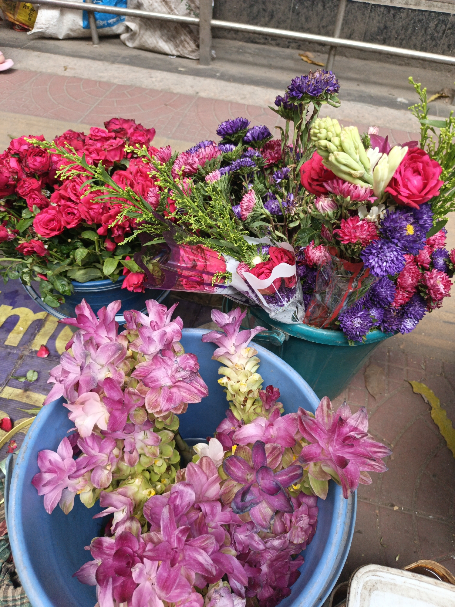 Flower vendor sells colorful blooms on Dhaka street