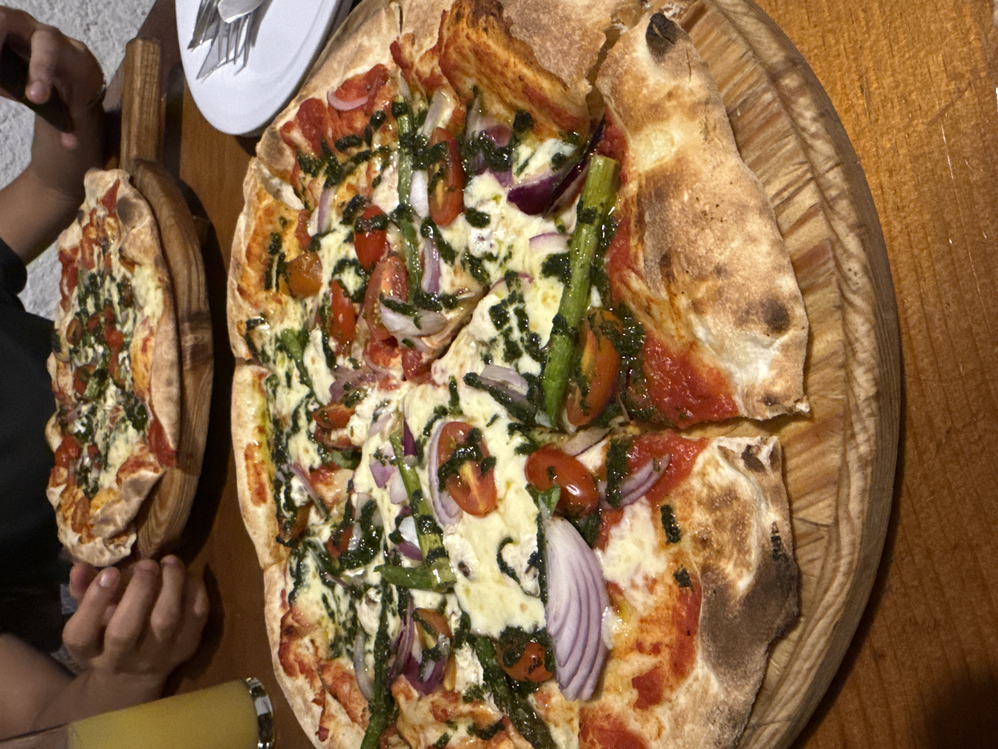 Late-night pizza dining captured at Chipilo restaurant