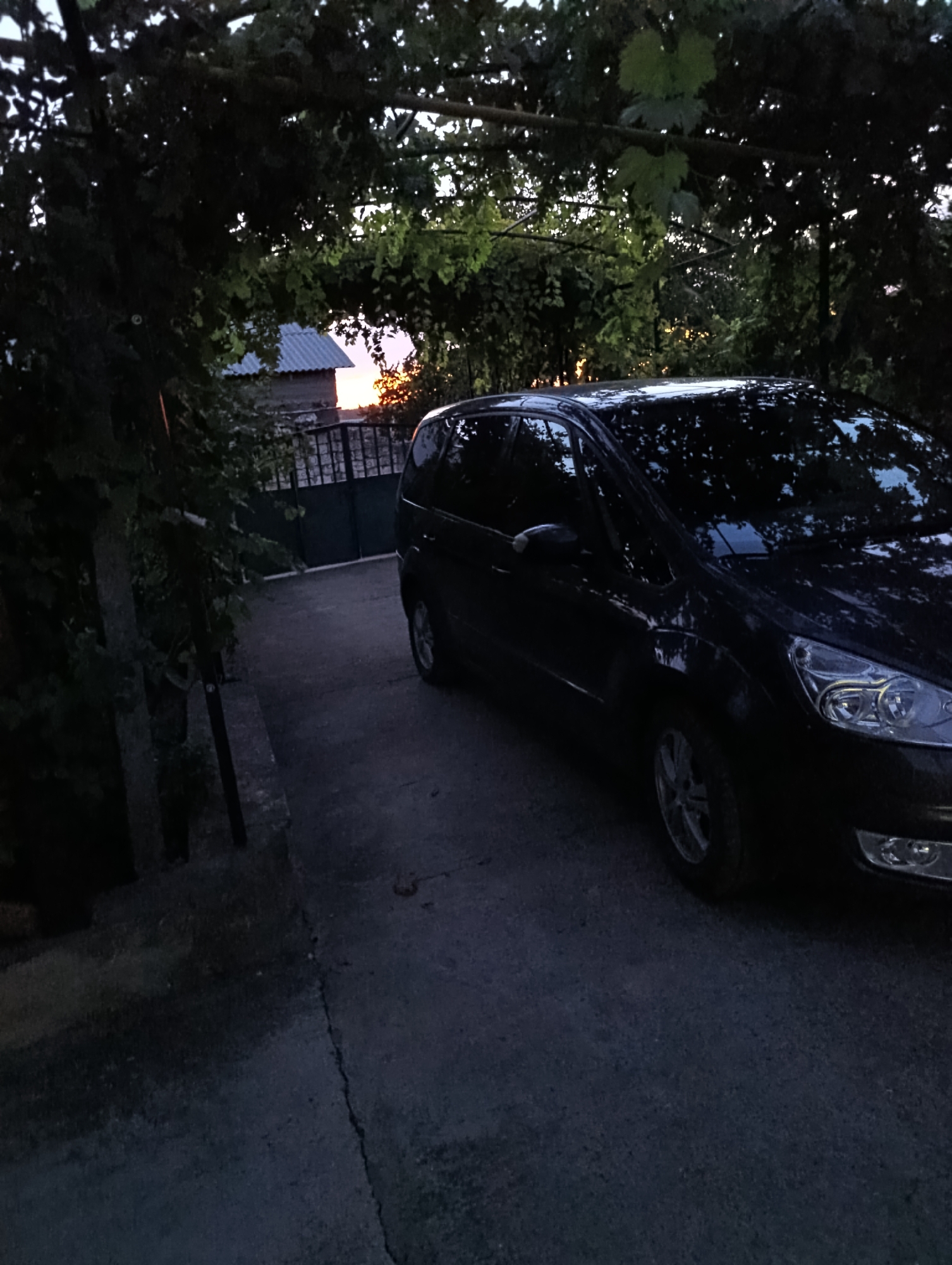 Dusk settles over a rural village in Roghi, Moldova