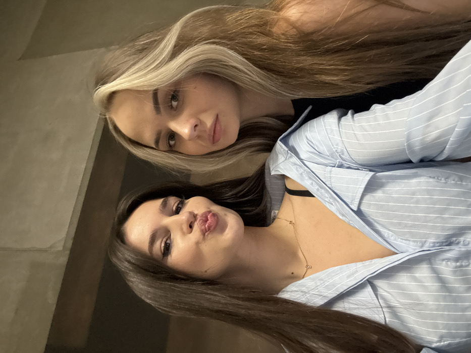 Two women take selfies during Moscow photo session