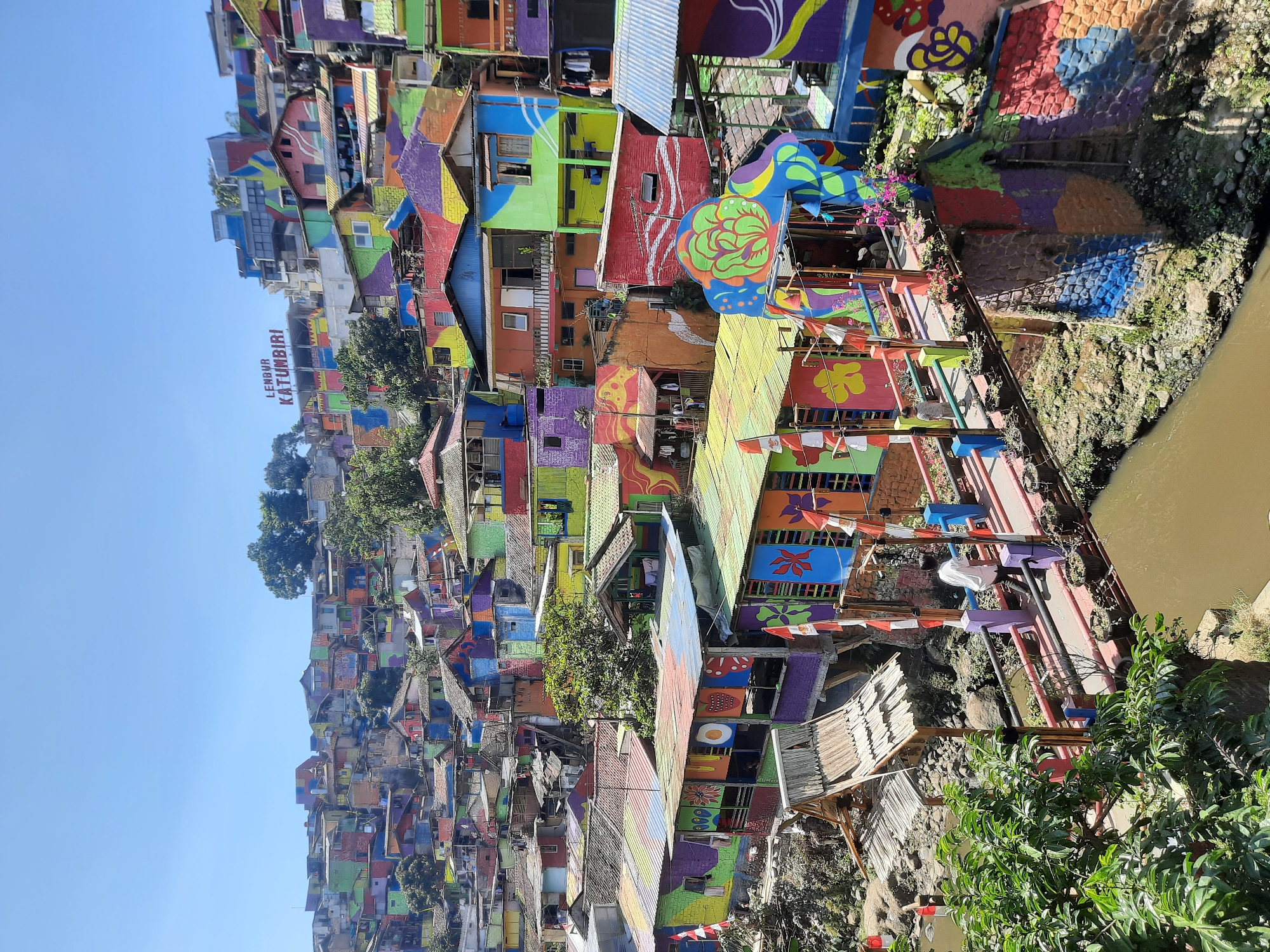 Bandung's Rainbow Village hillside in full color