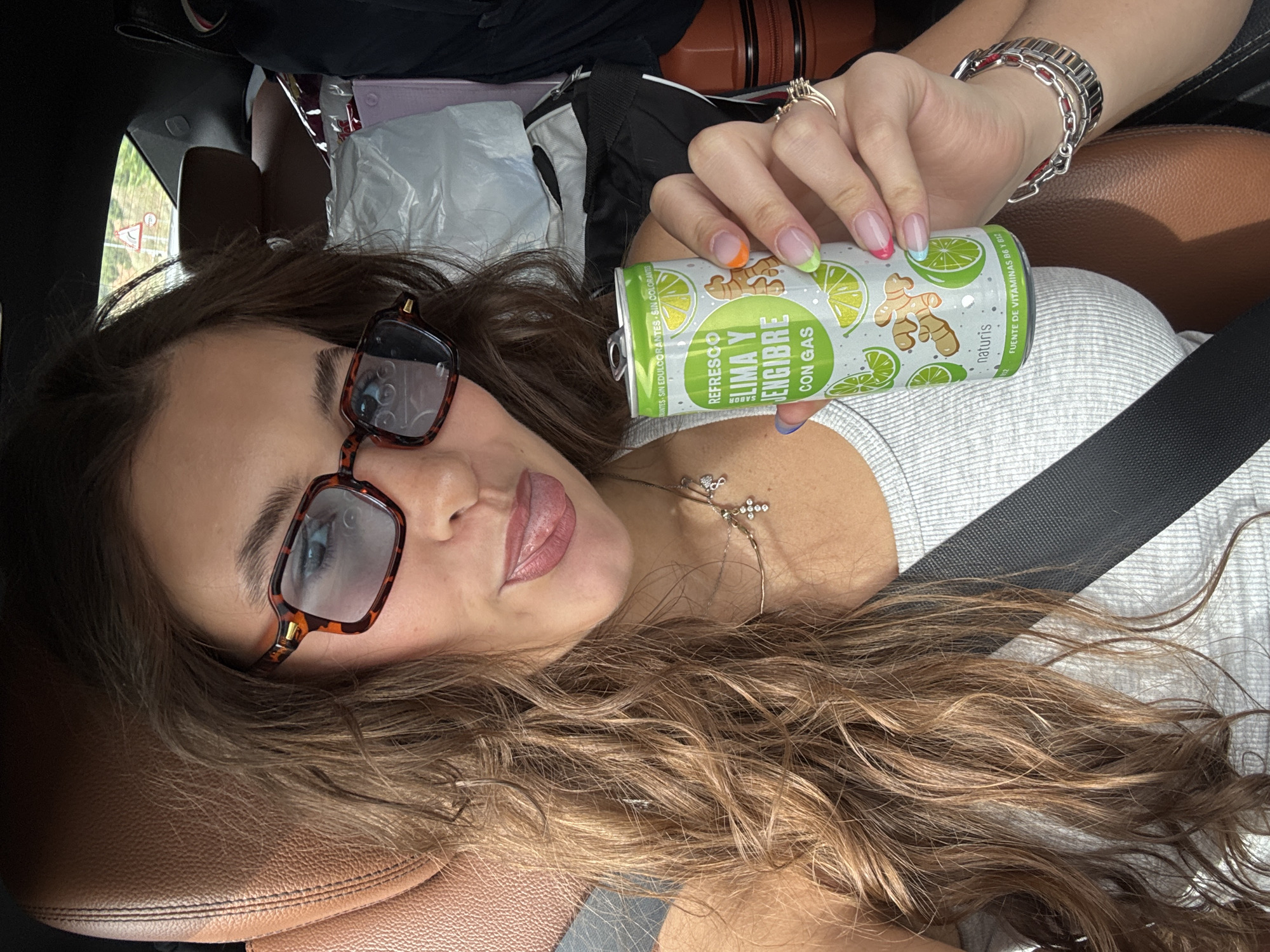 Woman takes selfie in car in Guadalajara, Spain