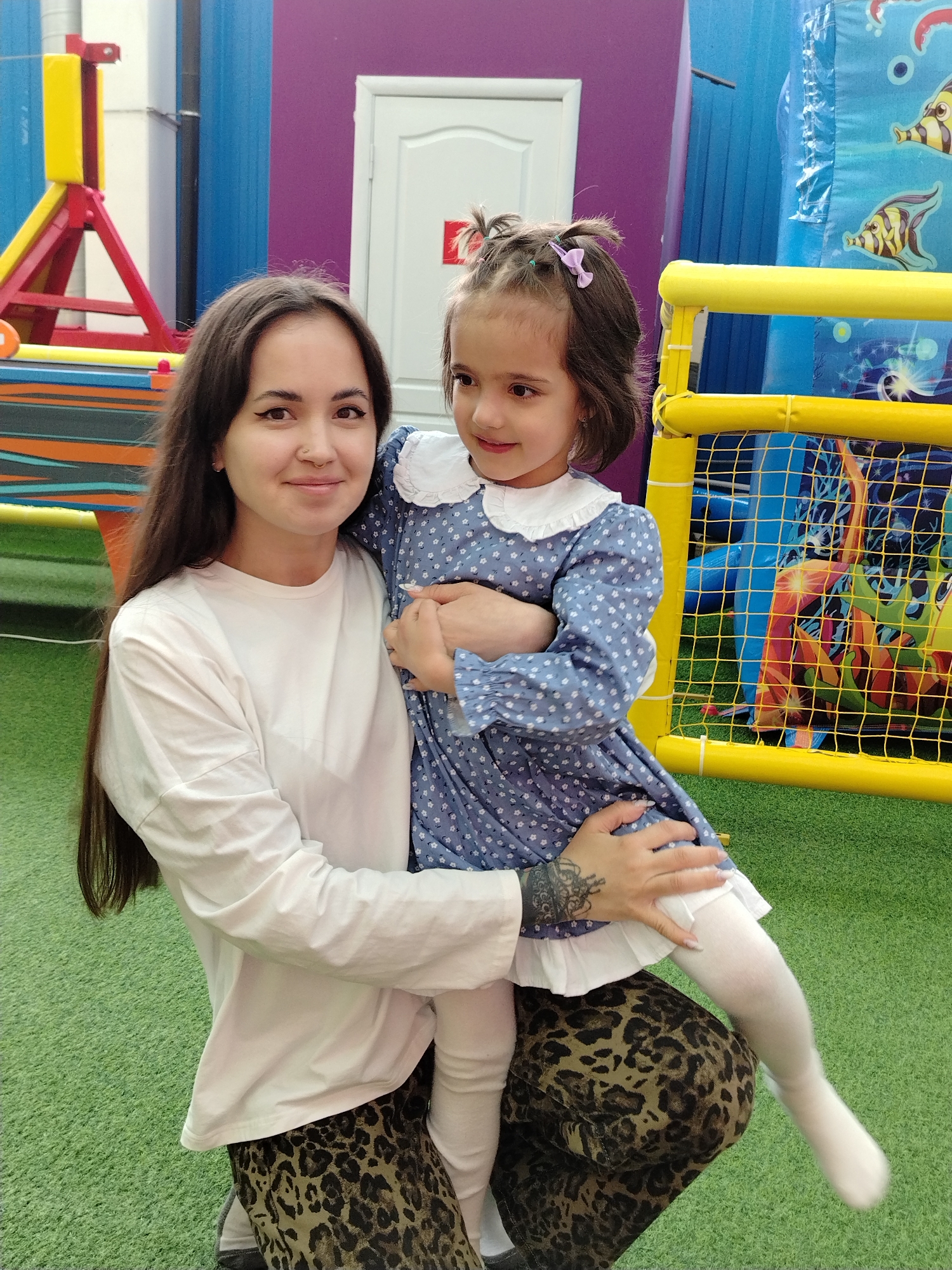 Families enjoy morning playtime at indoor recreation center