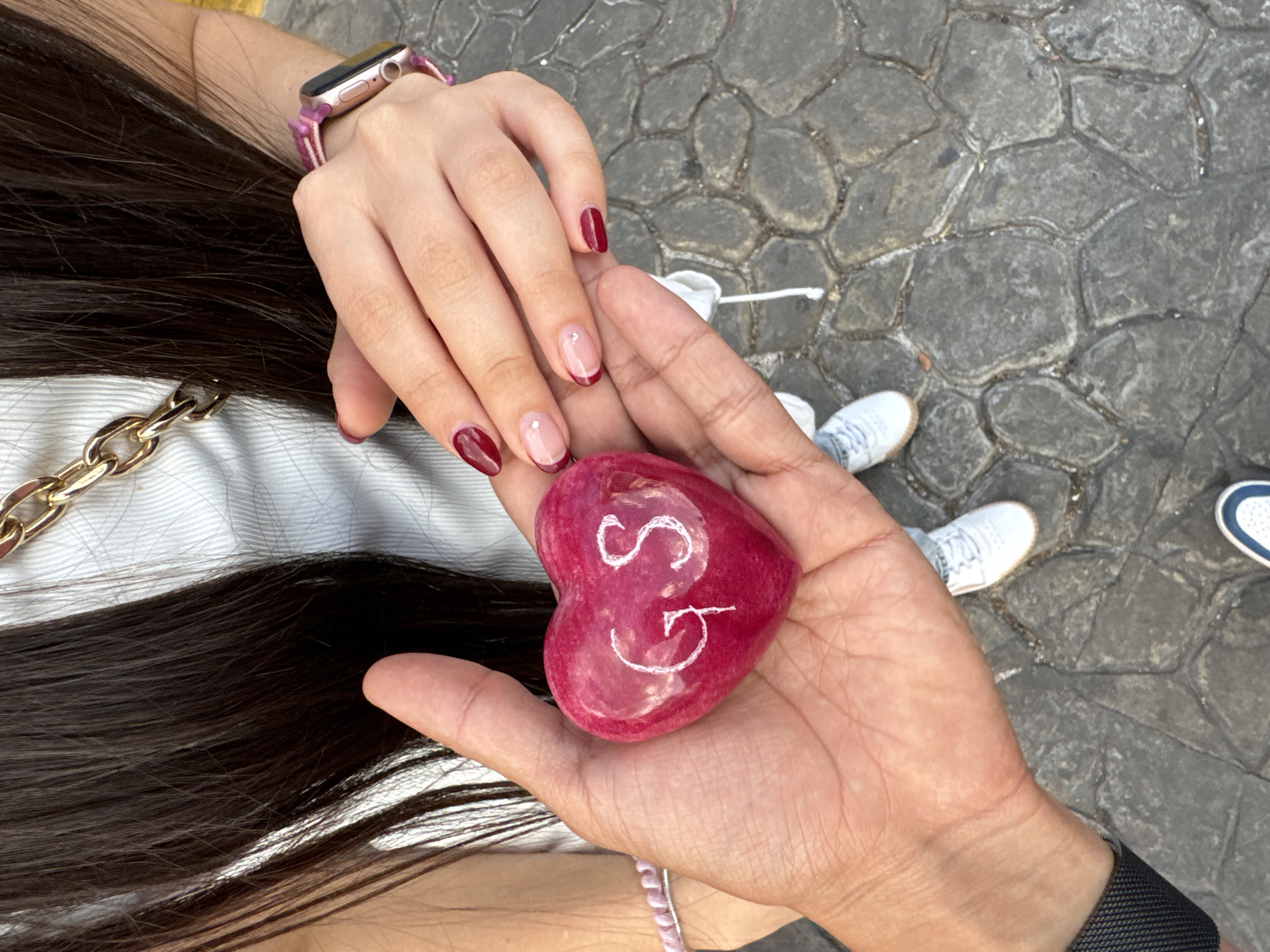 Couple holds hands outdoors in Atlixco, Mexico