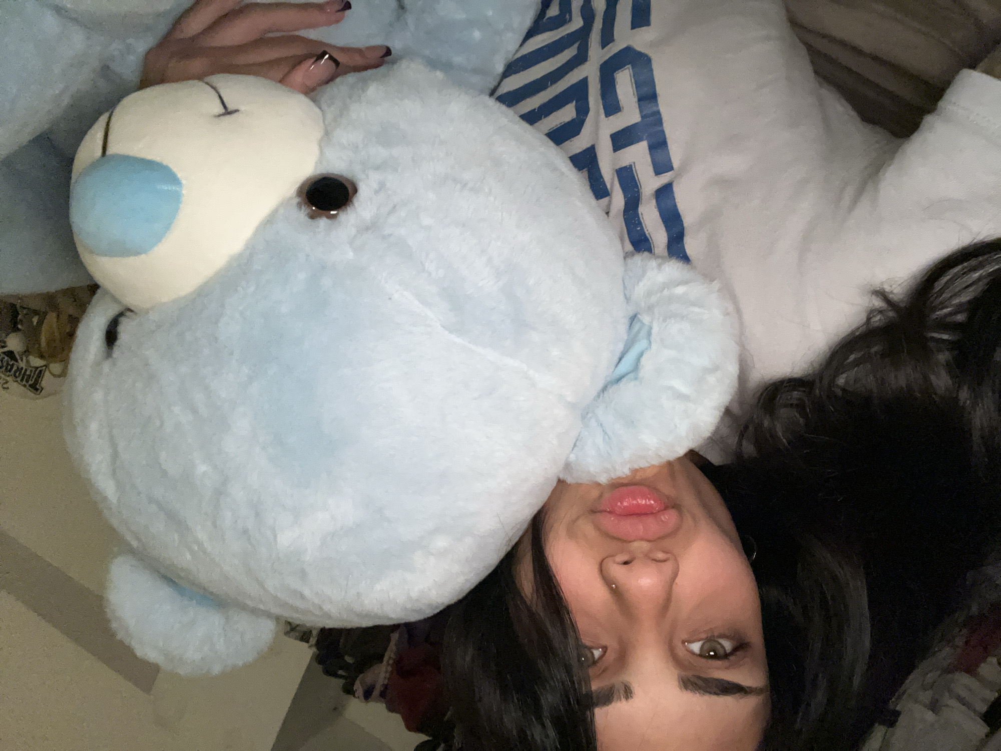 Woman cuddles with stuffed bear in Buenos Aires