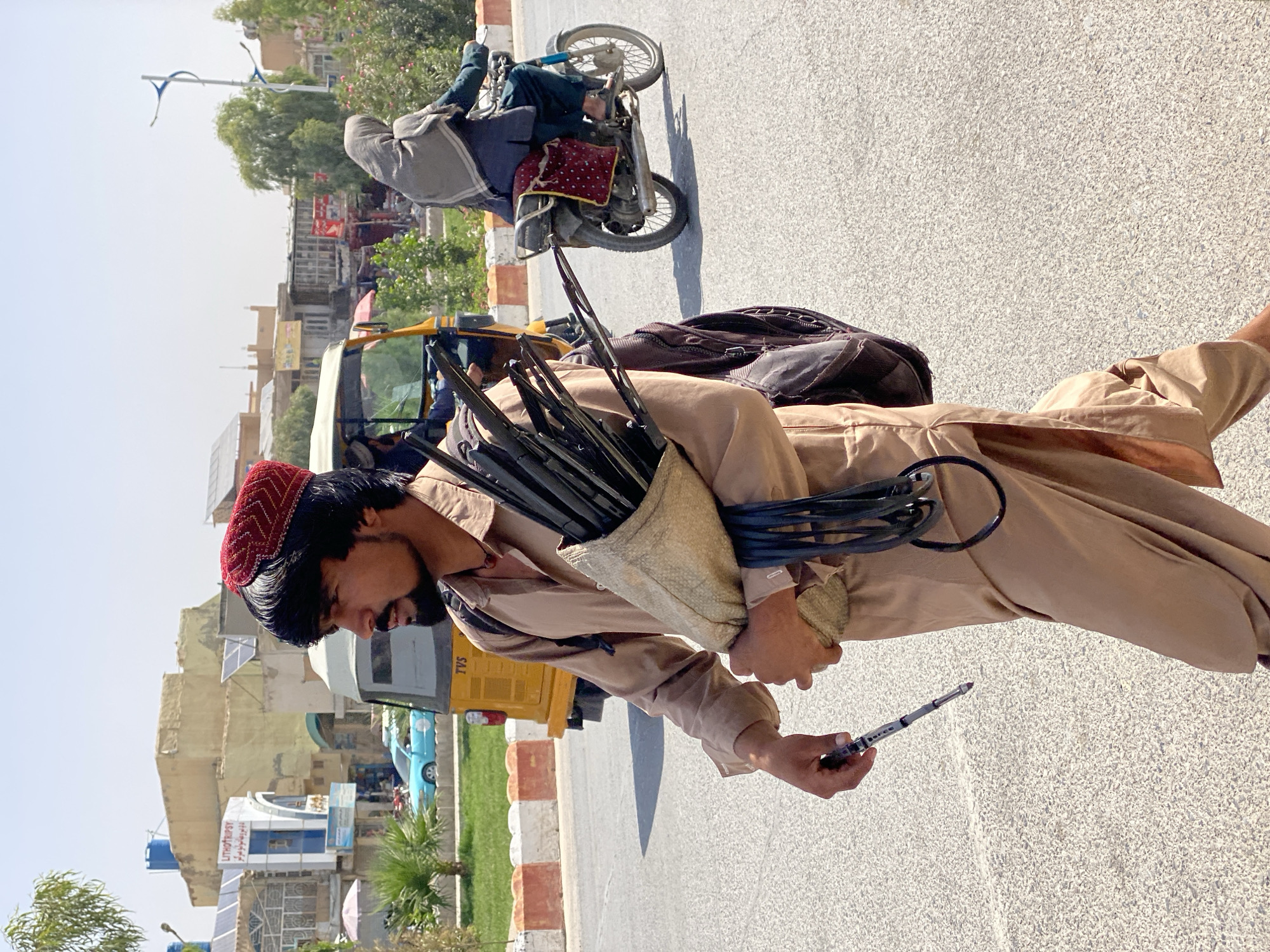 Everyday street life in a Kandahar market district