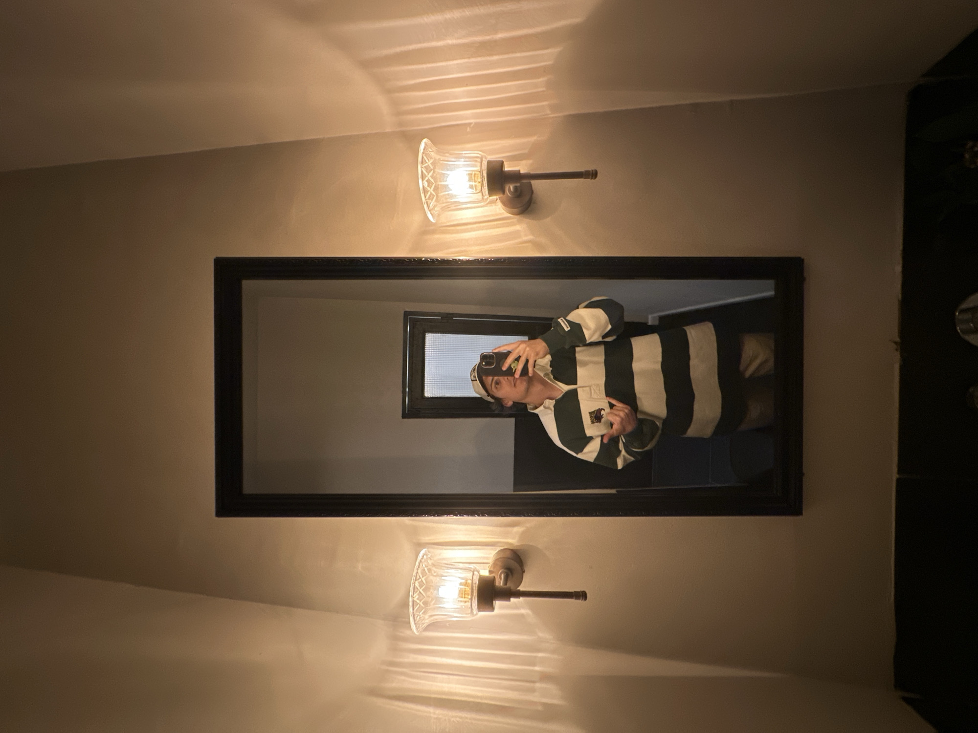 Tel-Aviv resident documents mirror selfie and street restaurant scene