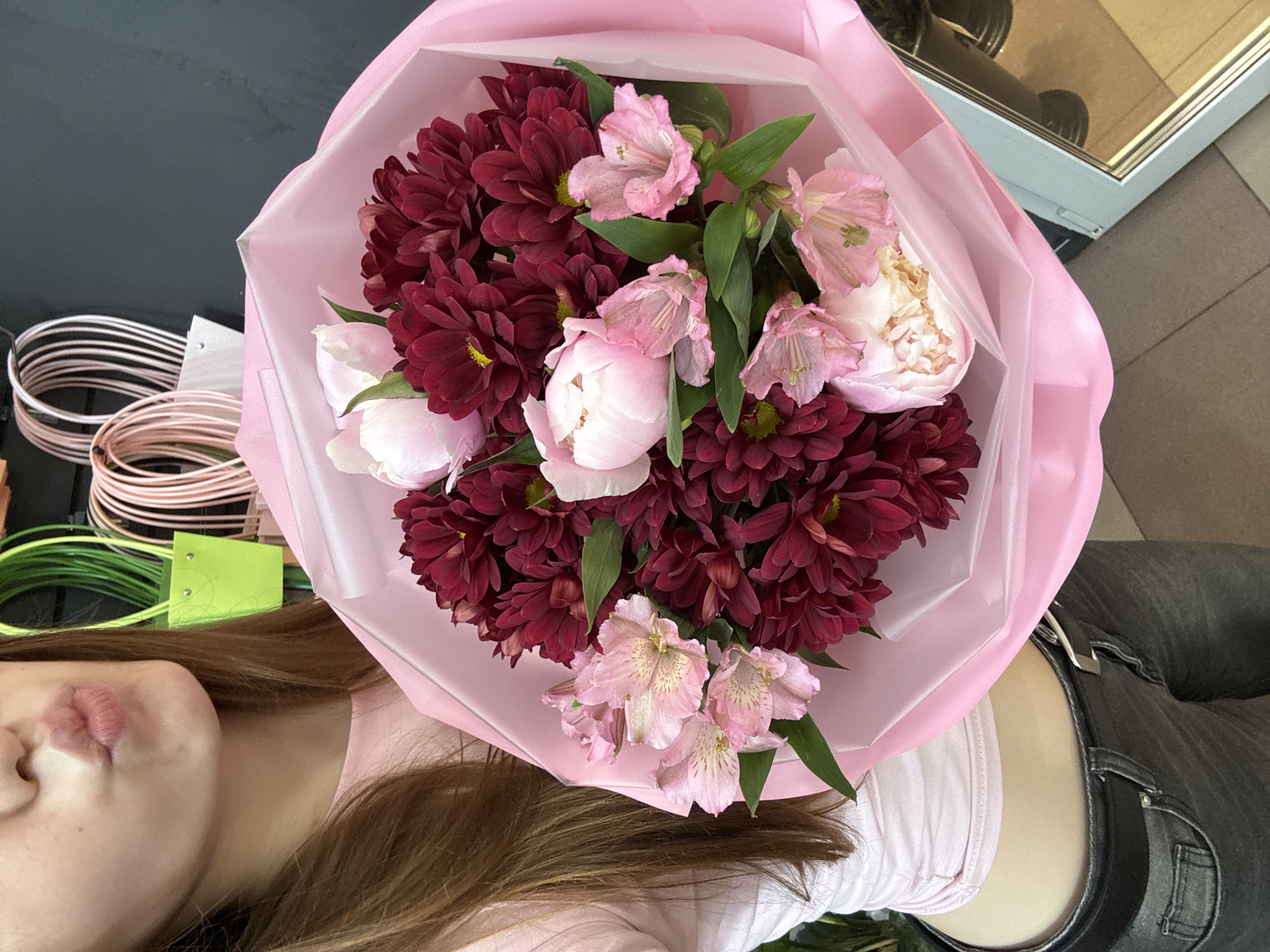Early morning flower bouquet purchase documented in Chaikovsky, Russia