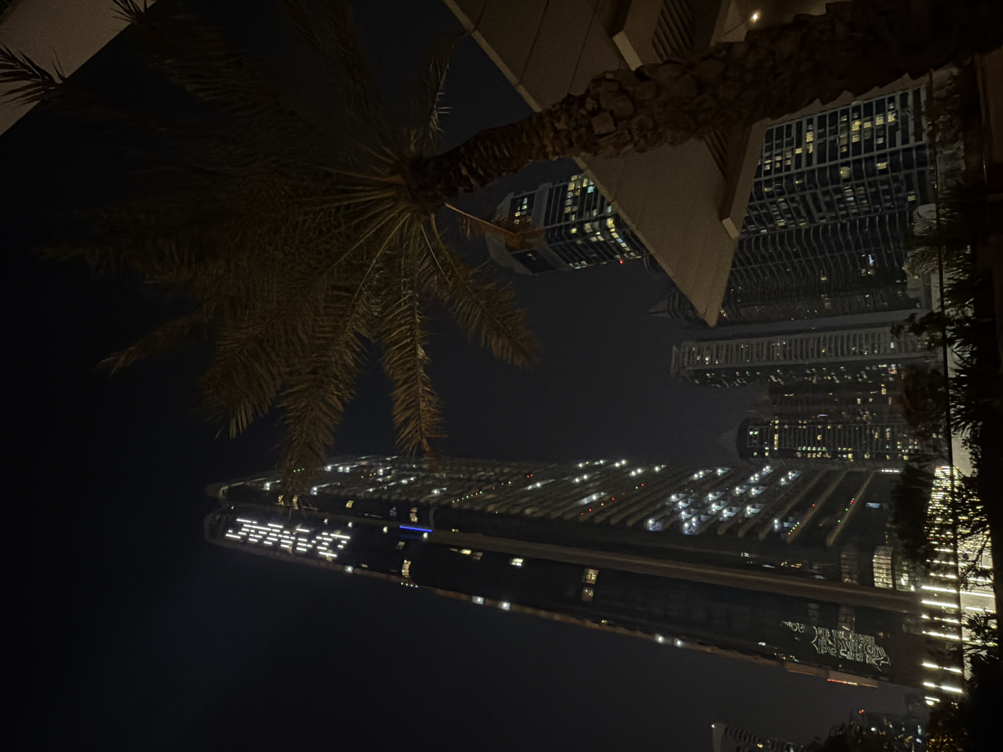 Dubai Business Bay skyline captured in nighttime photographs