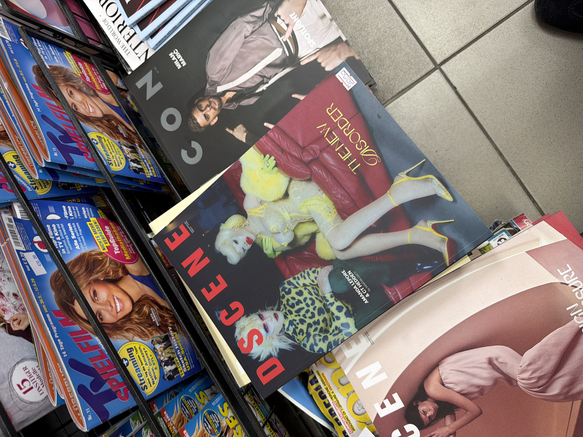 Magazine rack with international publications documented in Belgrade