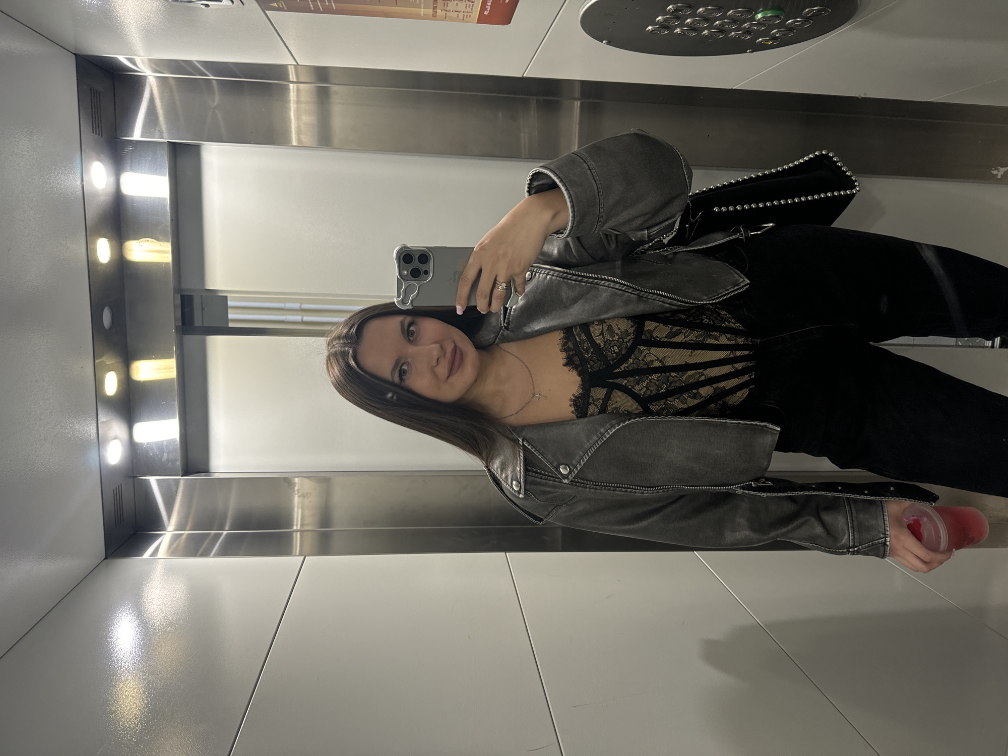 Woman takes elevator selfies in Odintsovo, Russia