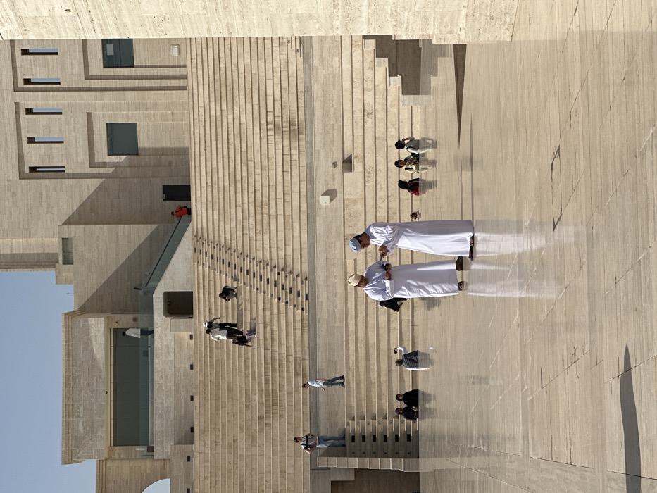 Tourist documents morning scenes across Doha cultural landmarks