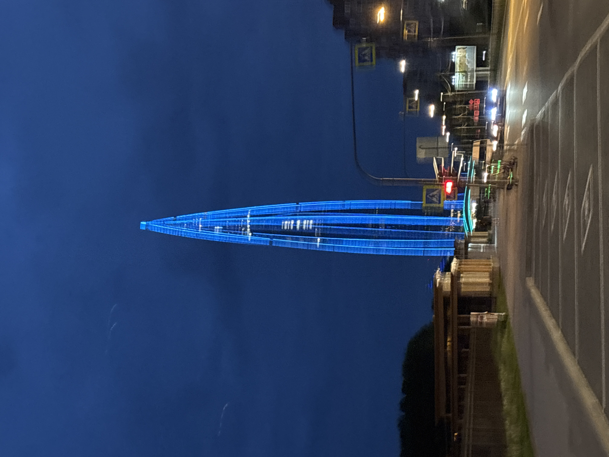 Evening scenes captured around illuminated Lakhta Center in Saint Petersburg