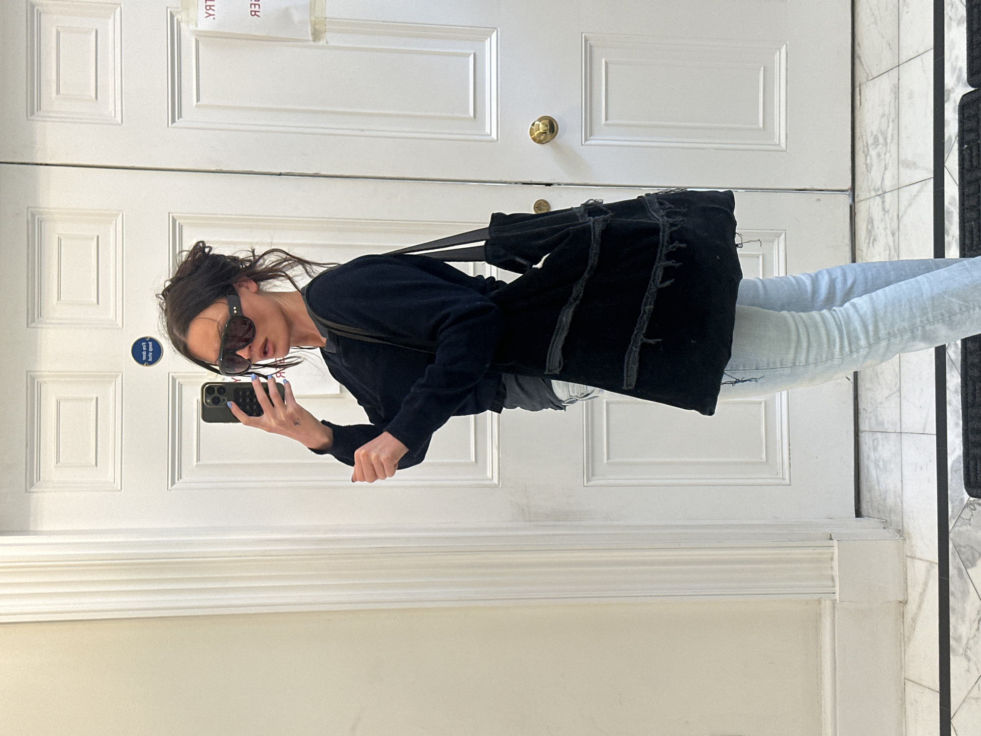 Person Takes Mirror Selfie Indoors in London