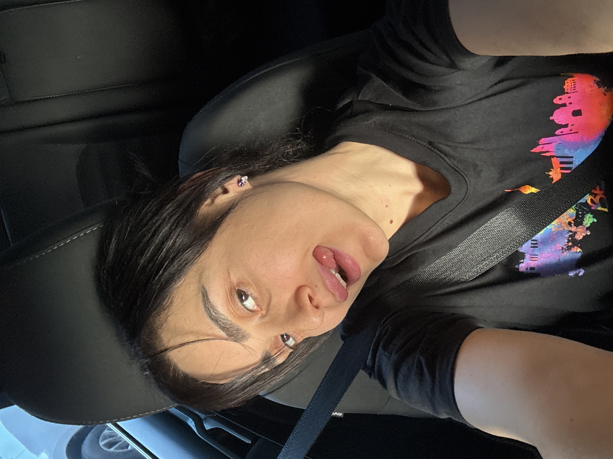 Woman in car observed wearing seatbelt in Tbilisi