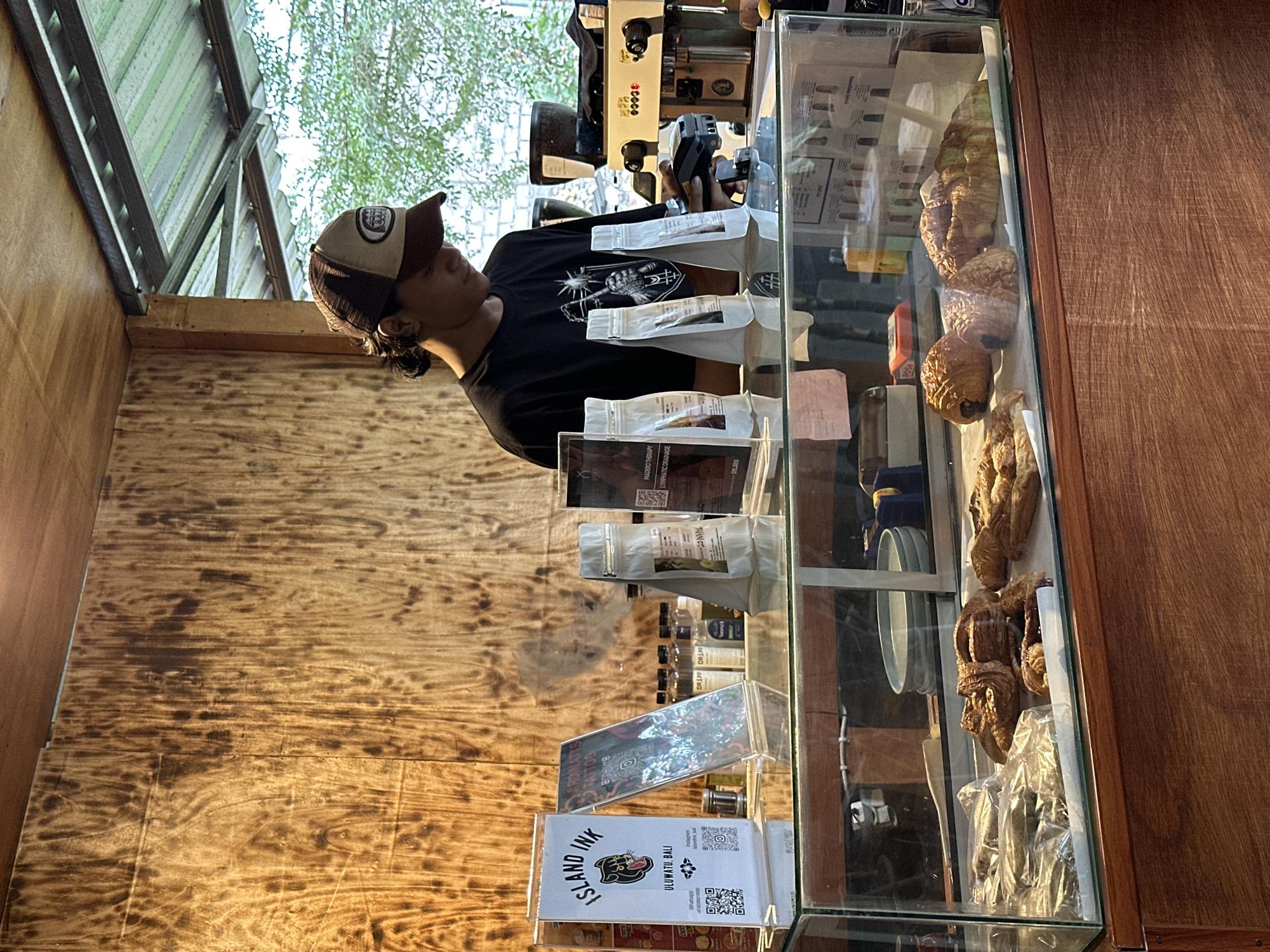 Inside a relaxed café-tattoo shop spot in Kuta Selatan