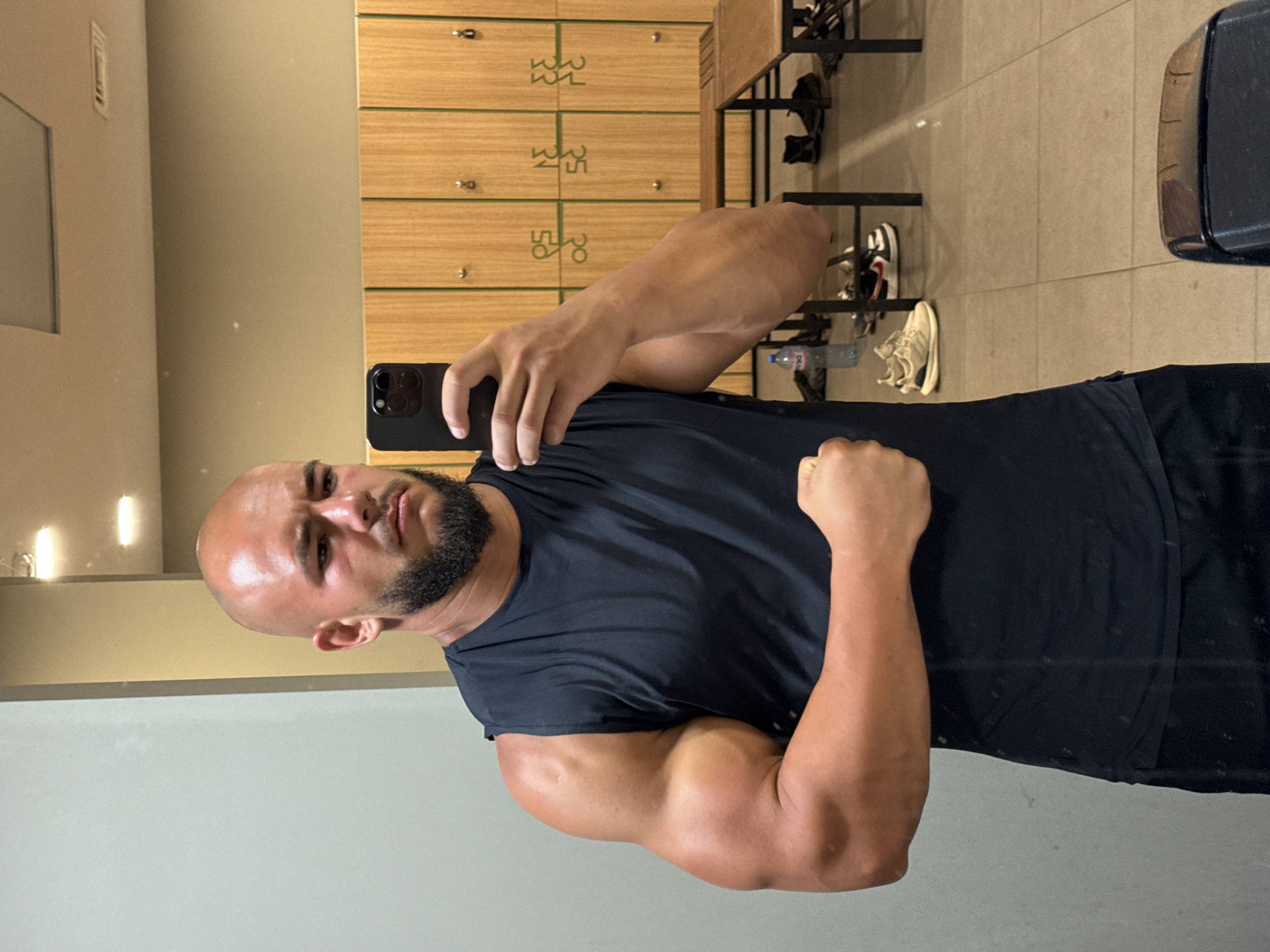 Post-workout mirror selfie in a Sofia gym locker room
