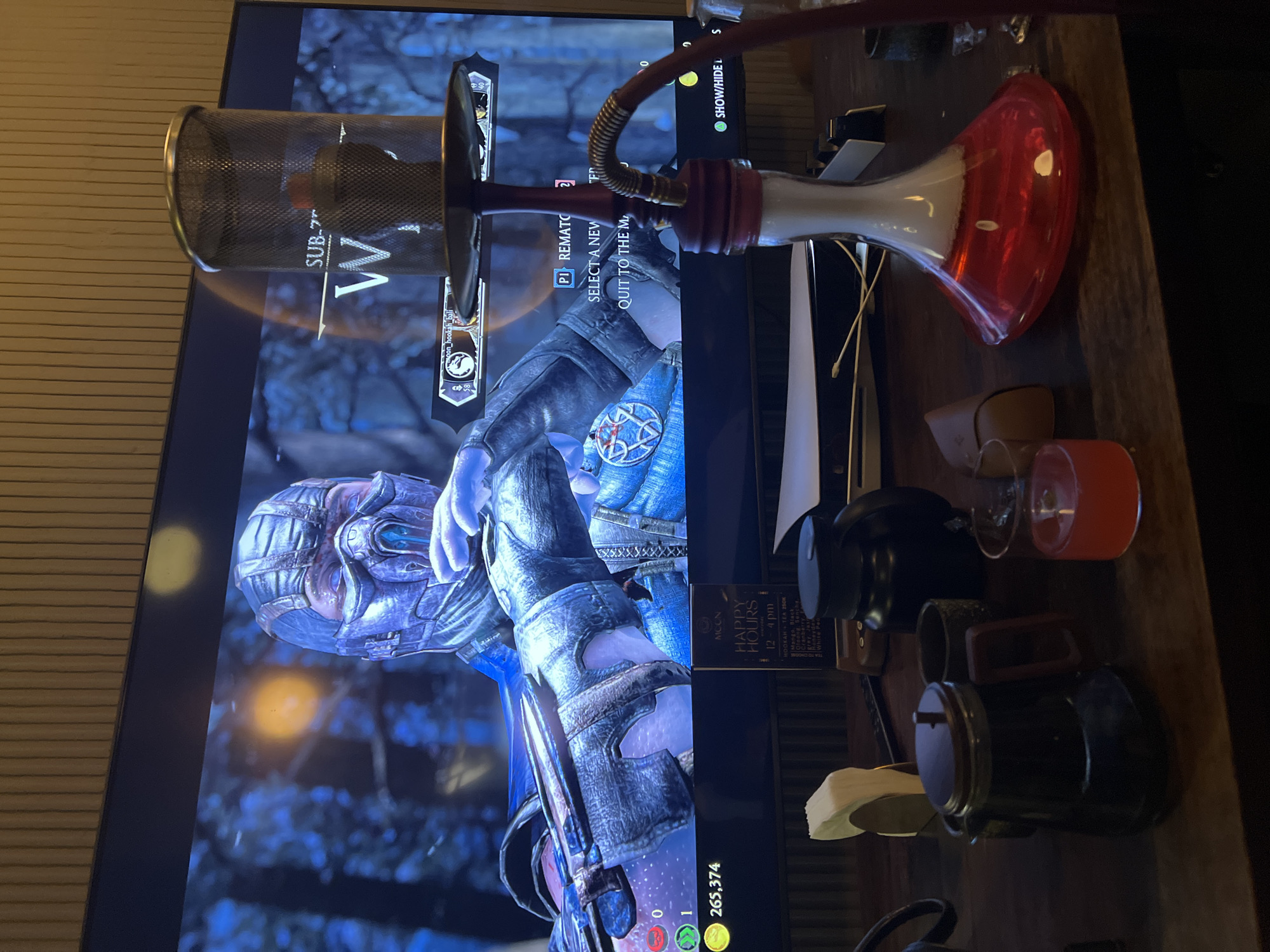 Gaming setup with hookah documented in North Kuta