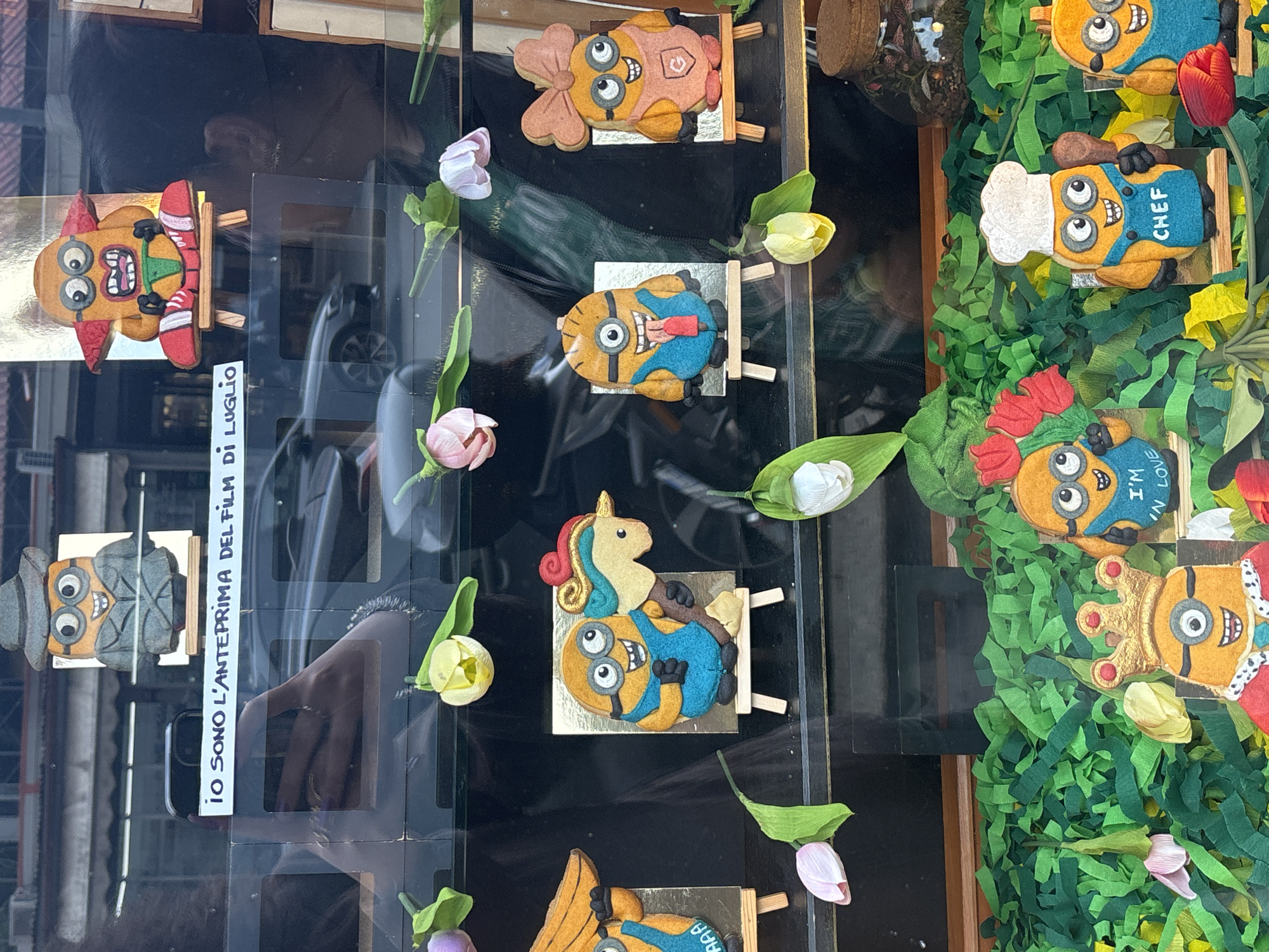Handmade Minion figures displayed in Milan shop window