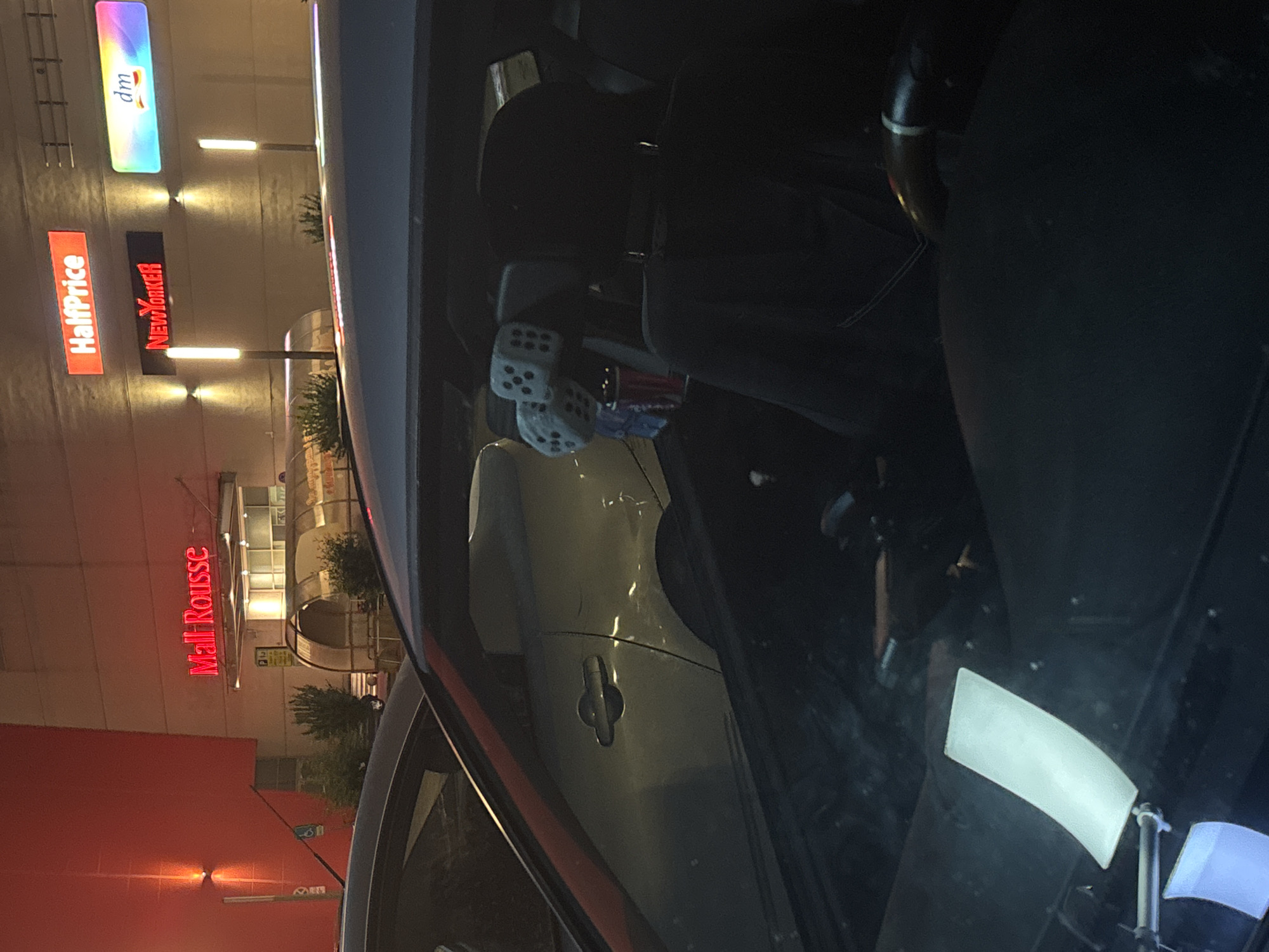 Evening activity near Mall Rousse includes tow truck and police presence