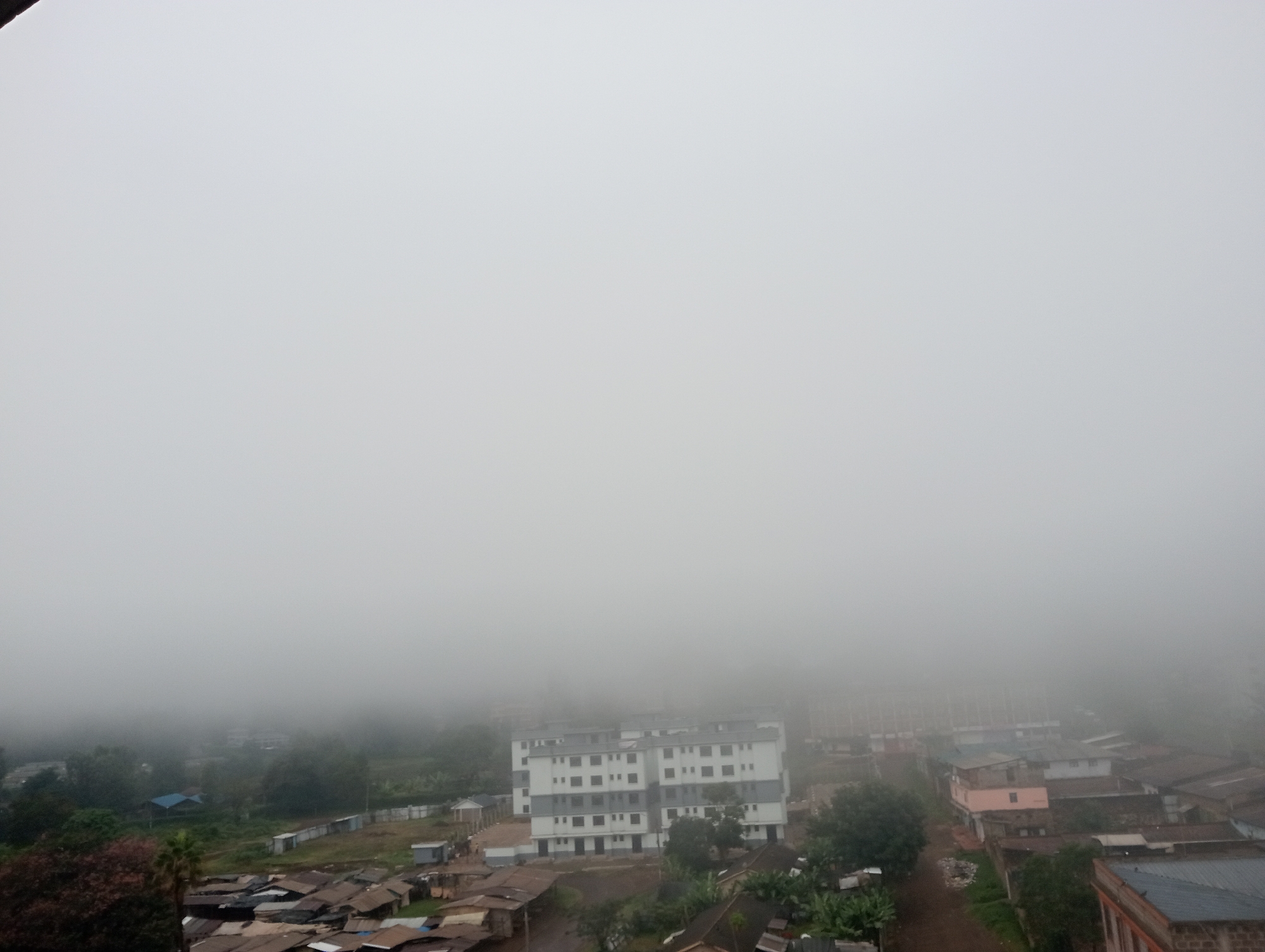 Dense fog blankets Kerugoya, Kenya in early morning hours