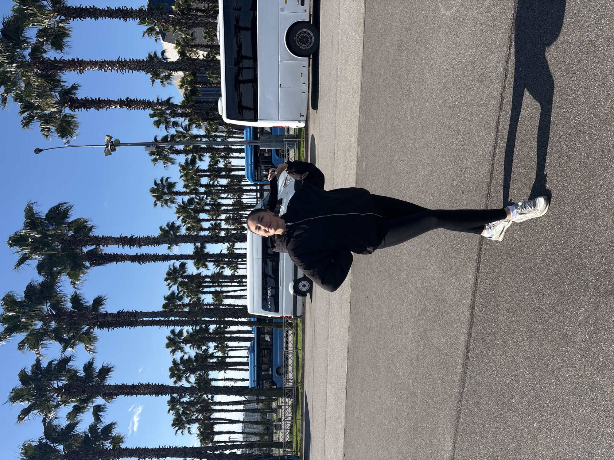 Morning walk captured near palm trees in Sirius, Russia