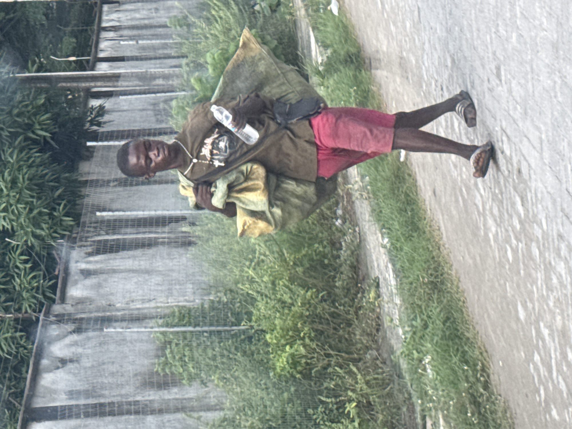 Afternoon scenes in Igboefon: a court seizure notice and balcony drinks