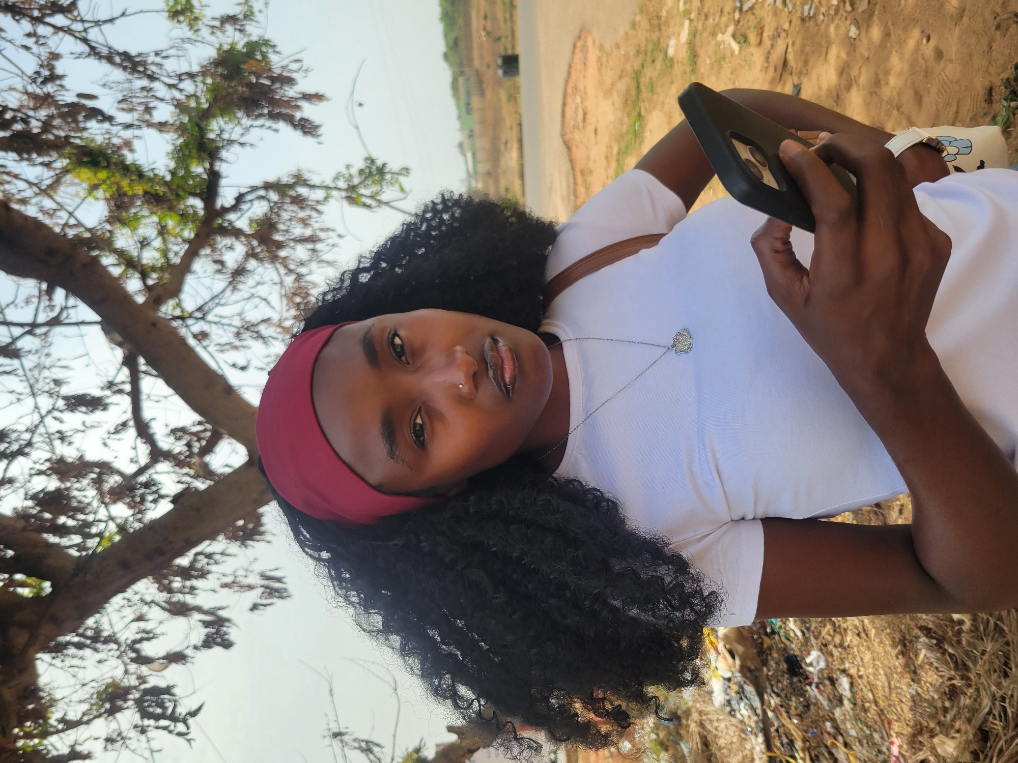 Woman photographed taking selfies in Jos, Nigeria