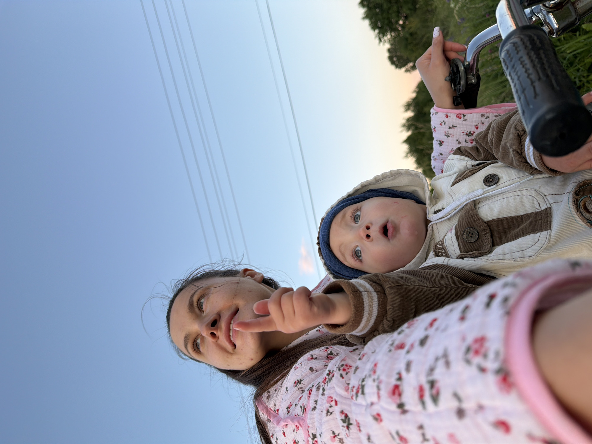 Dusk bike ride through a quiet Russian village with a child