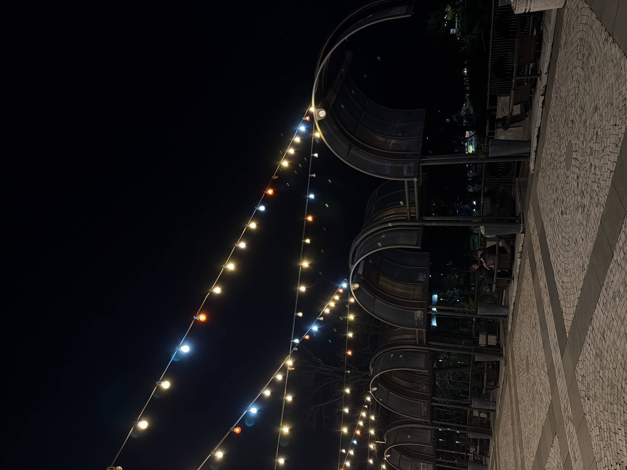 Colored lights illuminate nighttime public space in Blagoevgrad, Bulgaria