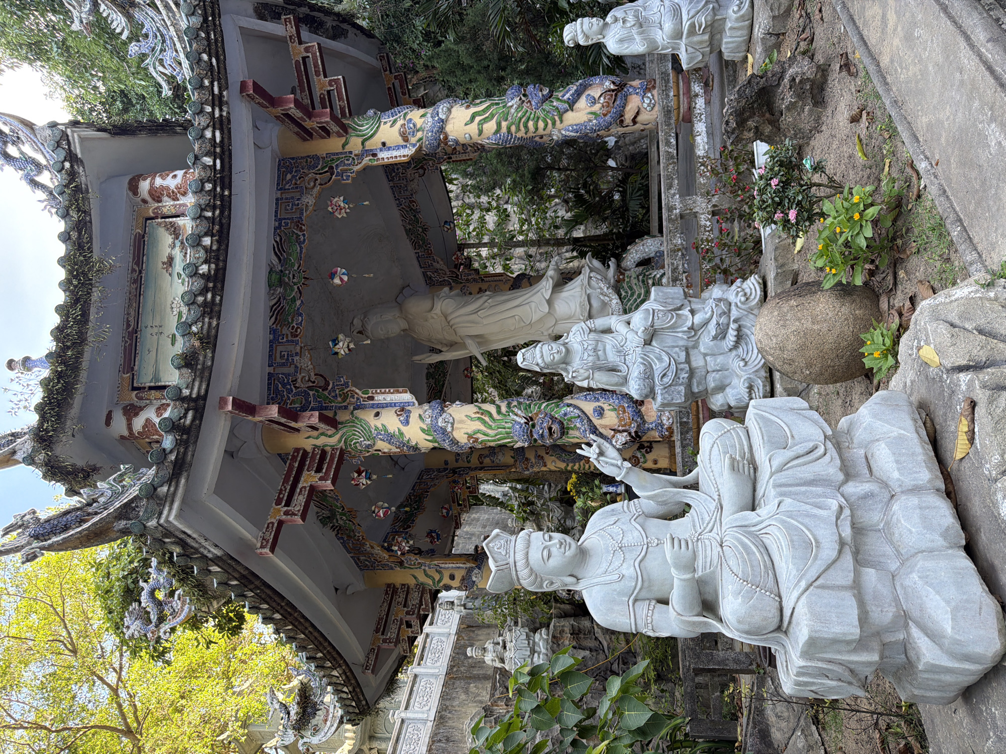 Tourist explores Marble Mountains temples and stone shops in Vietnam